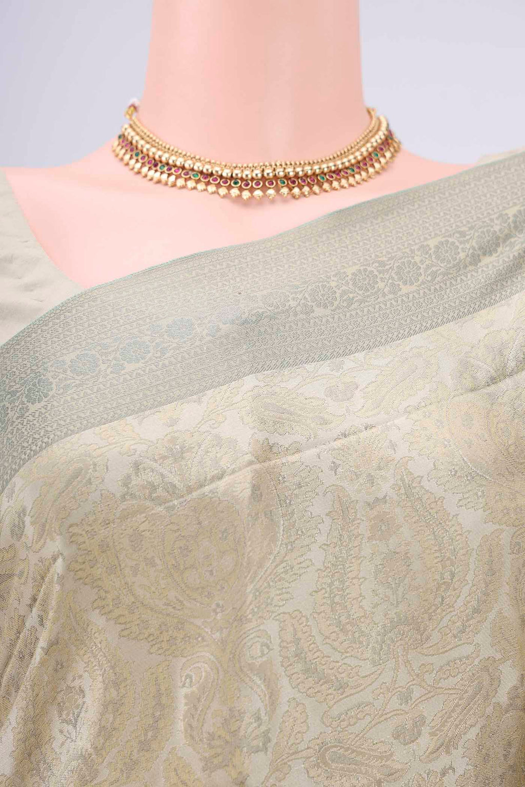 Border image of Beige Dual Tone Baluchari Silk Saree with Jacquard design on the body and Zari Border. 