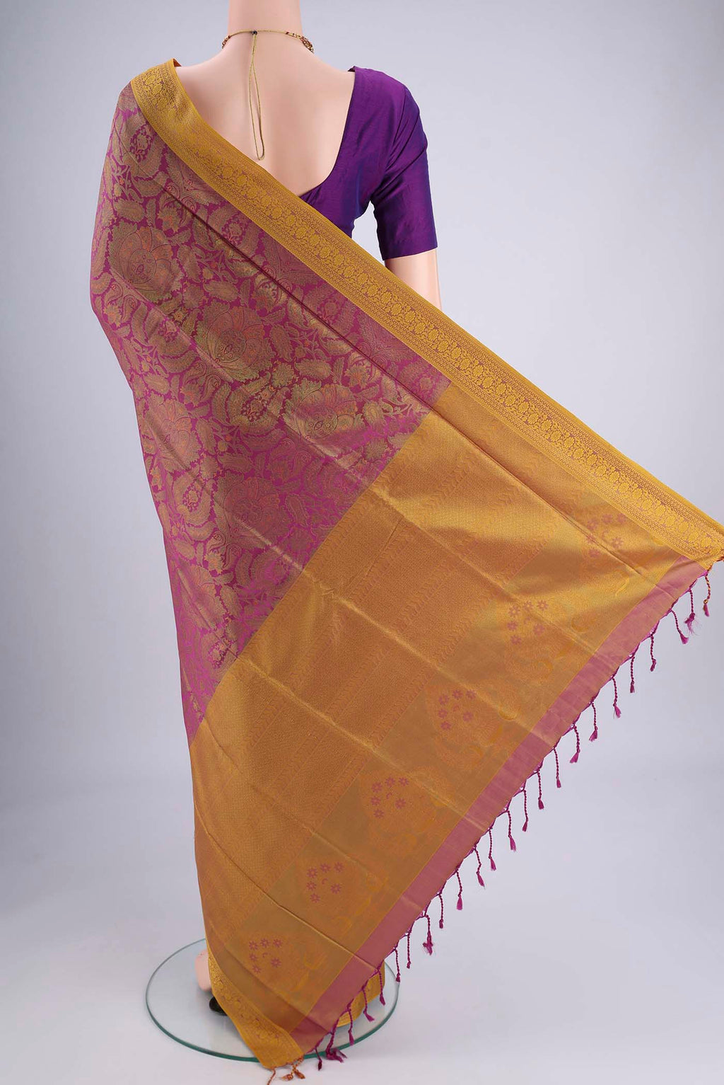Flat view of Magenta Soft Silk Saree with Jacquard design on the body and Thread Border. 