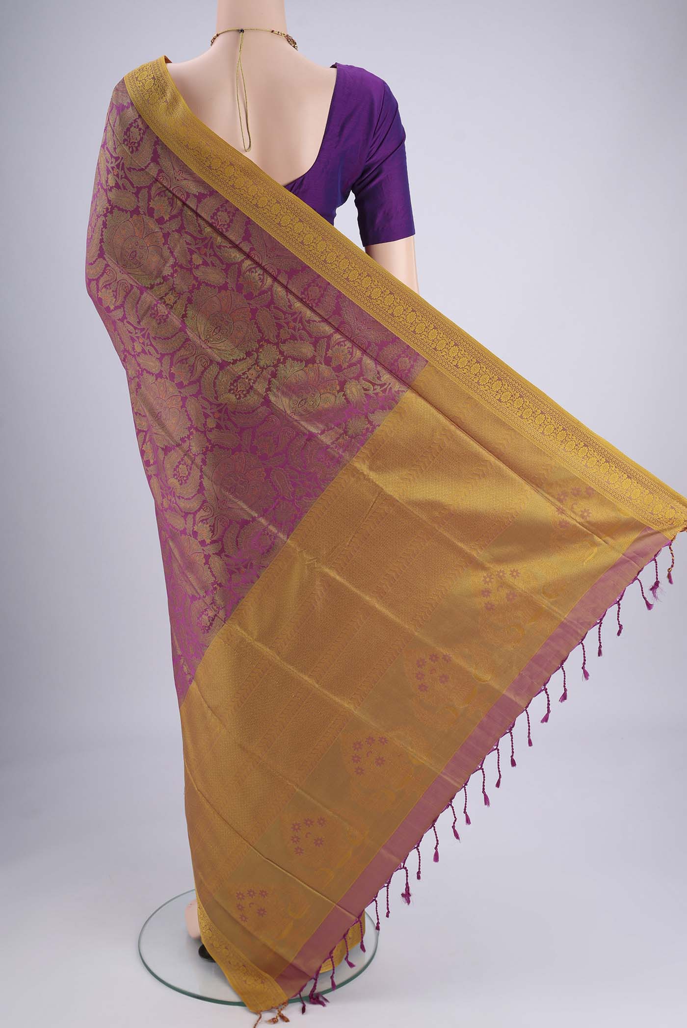 Flat view of Magenta Soft Silk Saree with Jacquard design on the body and Thread Border. 