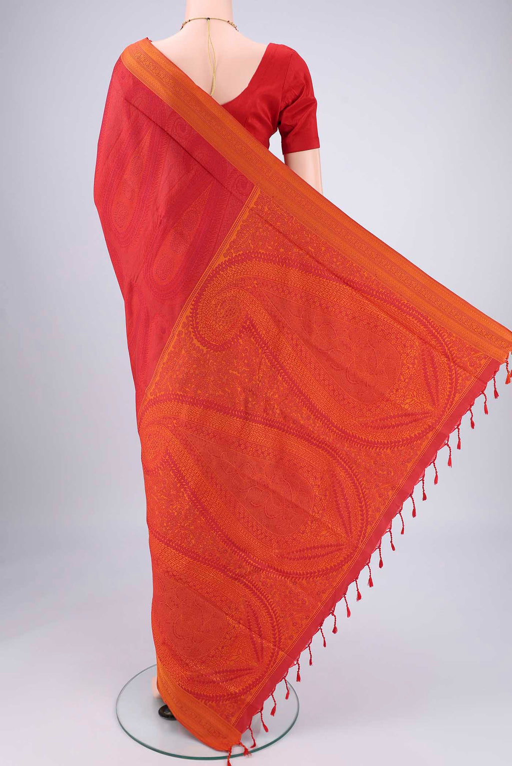 Flat view of Red Soft Silk Saree with Jacquard design on the body and Thread Border. 