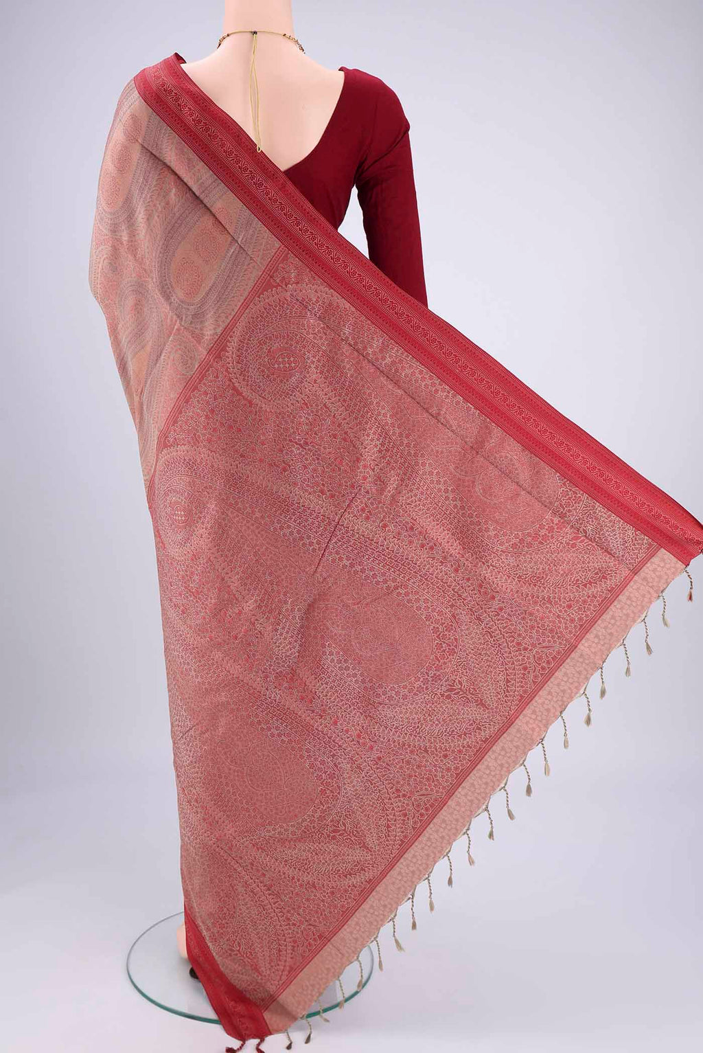 Flat view of Coral Soft Silk Saree with Jacquard design on the body and Thread Border. 