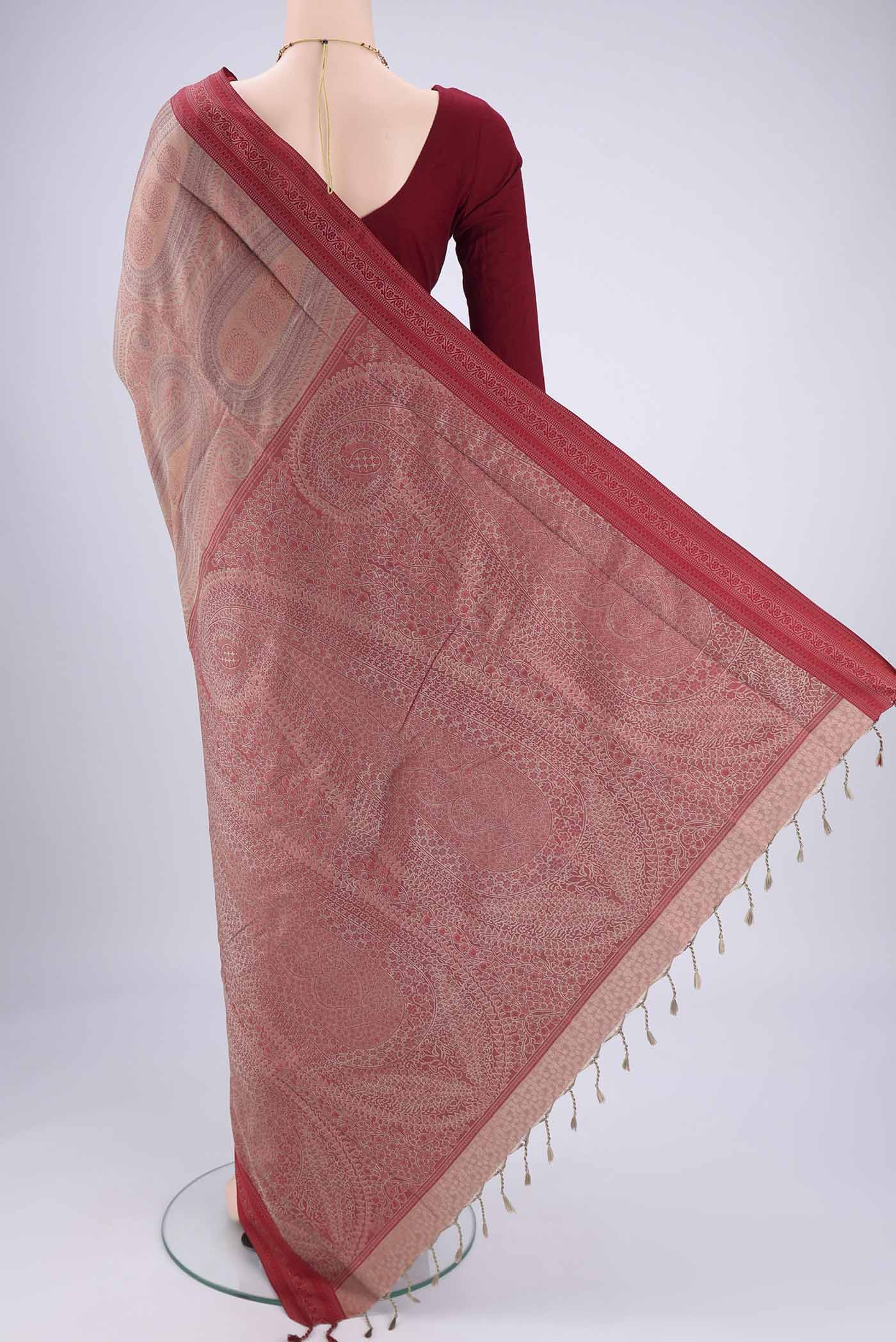 Flat view of Coral Soft Silk Saree with Jacquard design on the body and Thread Border. 