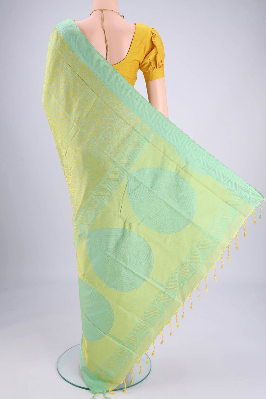 Flat view of Acid Green Soft Silk Saree with Jacquard design on the body and Thread Border. 