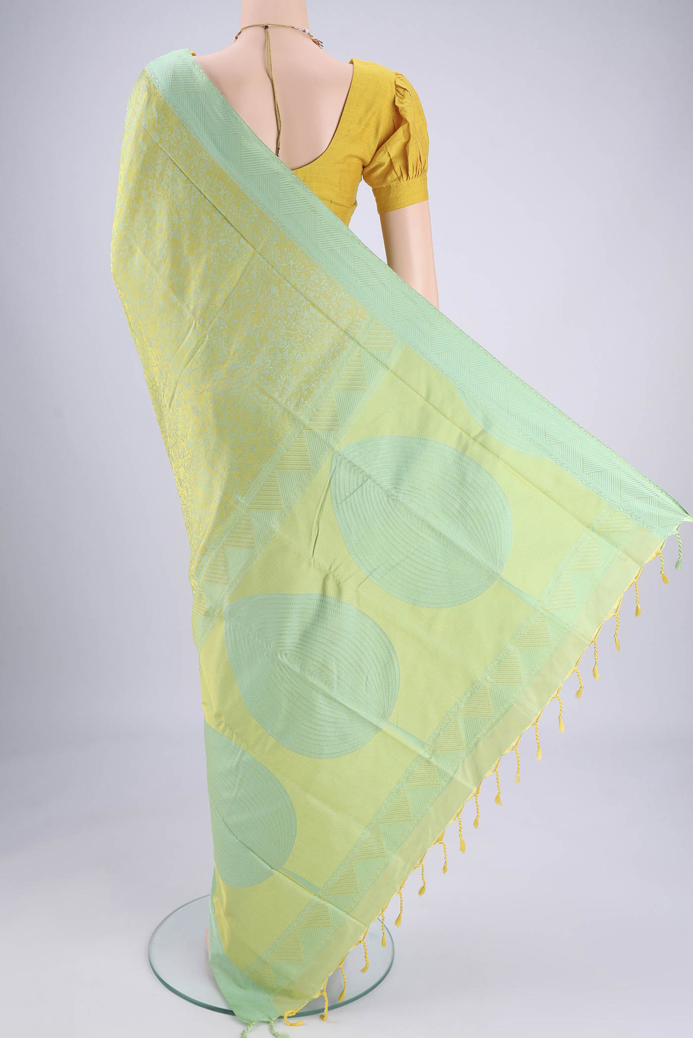 Flat view of Acid Green Soft Silk Saree with Jacquard design on the body and Thread Border. 
