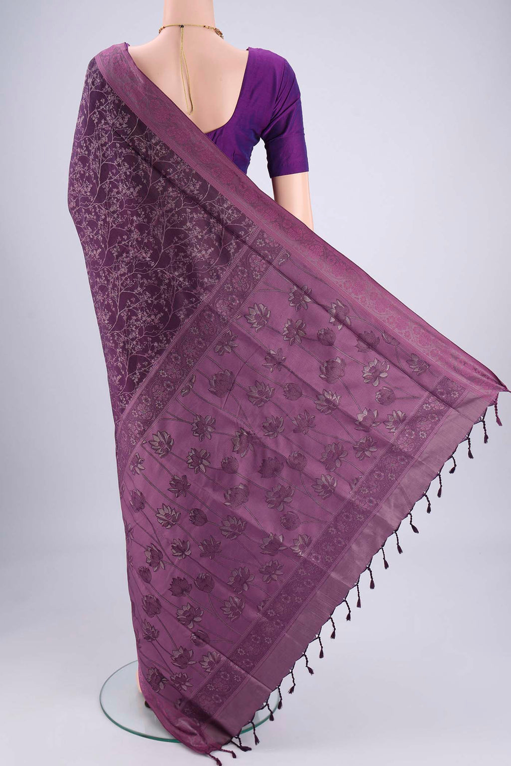 Flat view of Purple Soft Silk Saree with Jacquard design on the body and Thread Border. 