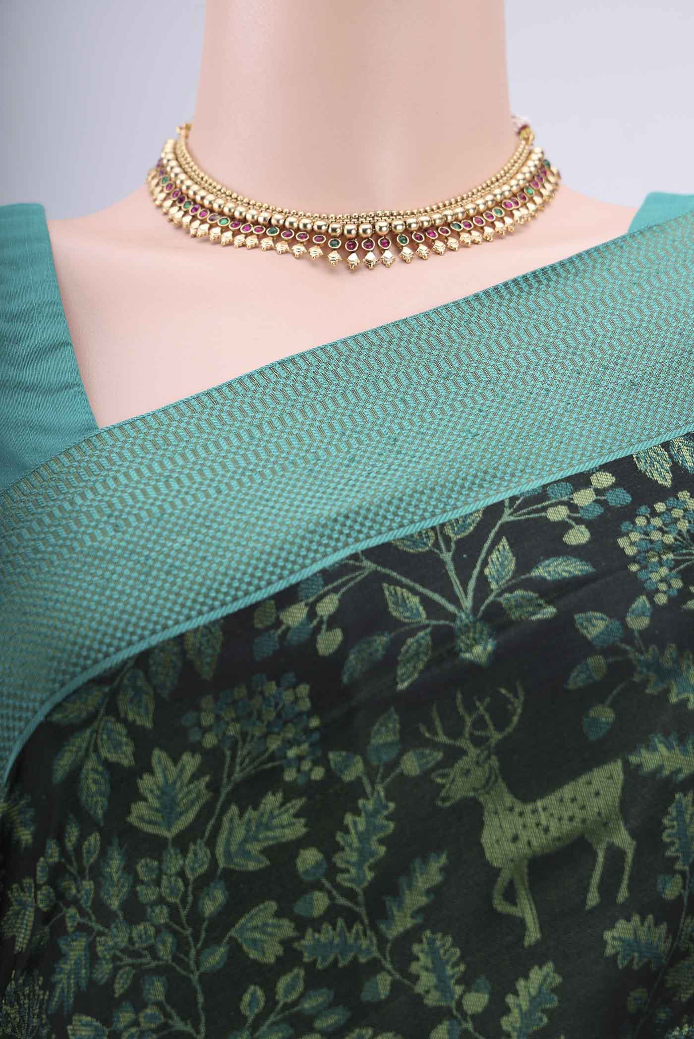 Border image of Olive Green Dual Tone Baluchari Silk Saree with Jacquard design on the body and Zari Border. 