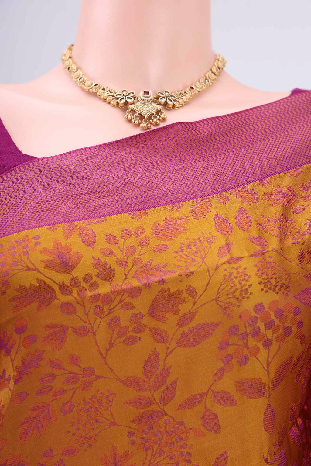 Border image of Mustard Dual Tone Baluchari Silk Saree with Jacquard design on the body and Zari Border. 