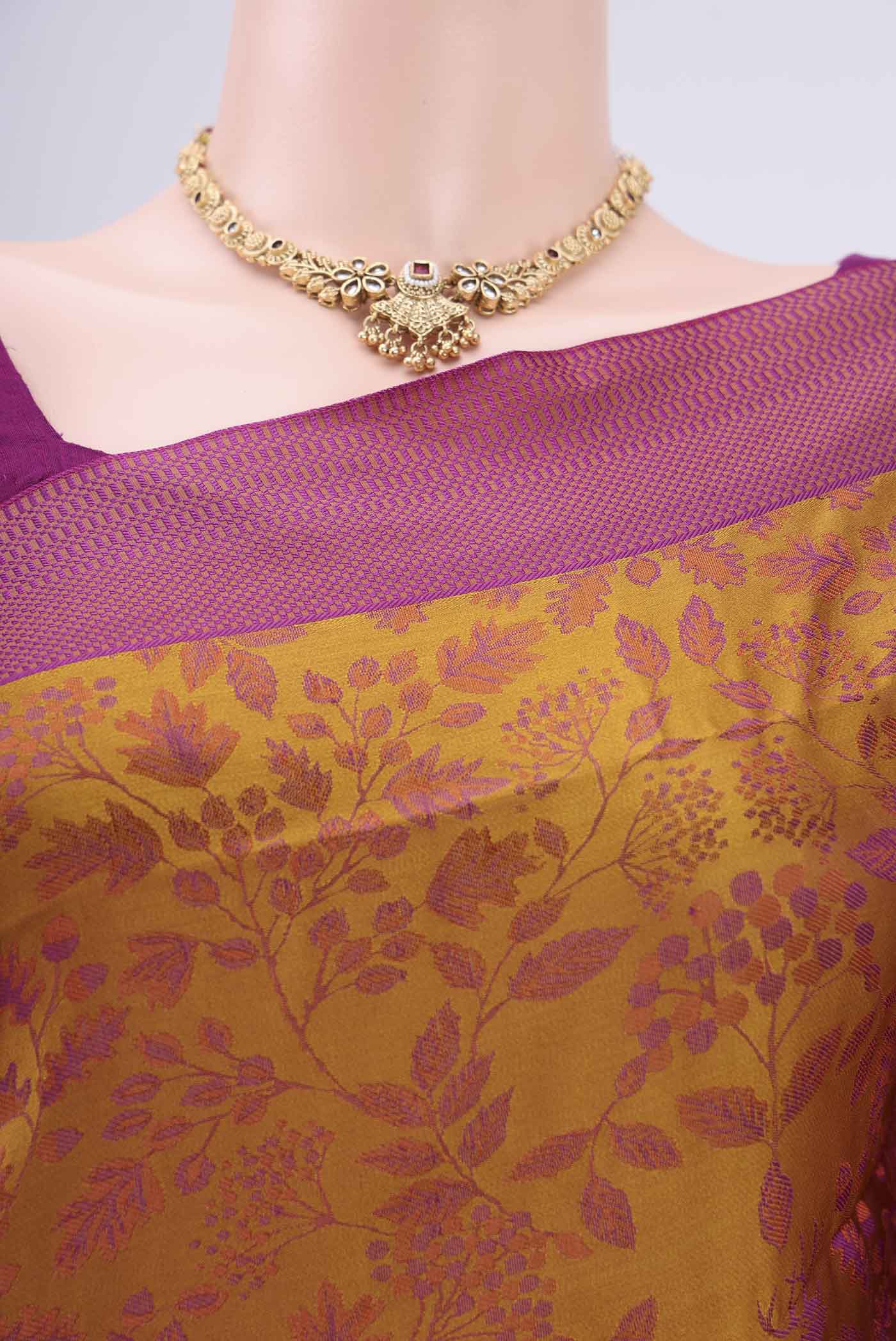 Border image of Mustard Dual Tone Baluchari Silk Saree with Jacquard design on the body and Zari Border. 