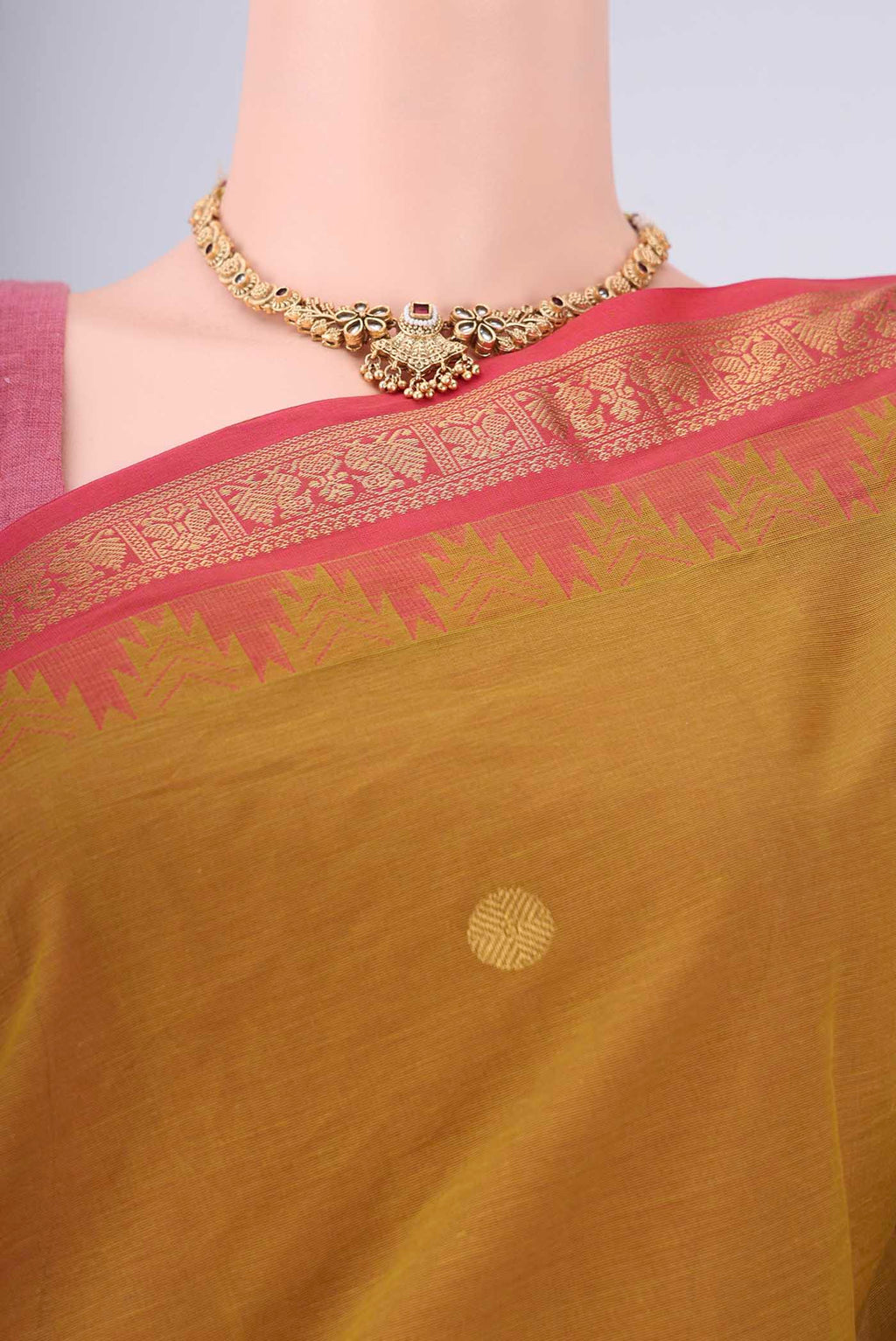 Border image of Mehandi Green Kanchi Cotton Saree with Polka Dots on the body and Temple Border. 