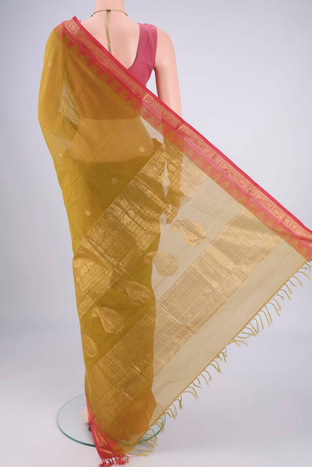 Flat view of Mehandi Green Kanchi Cotton Saree with Polka Dots on the body and Temple Border. 