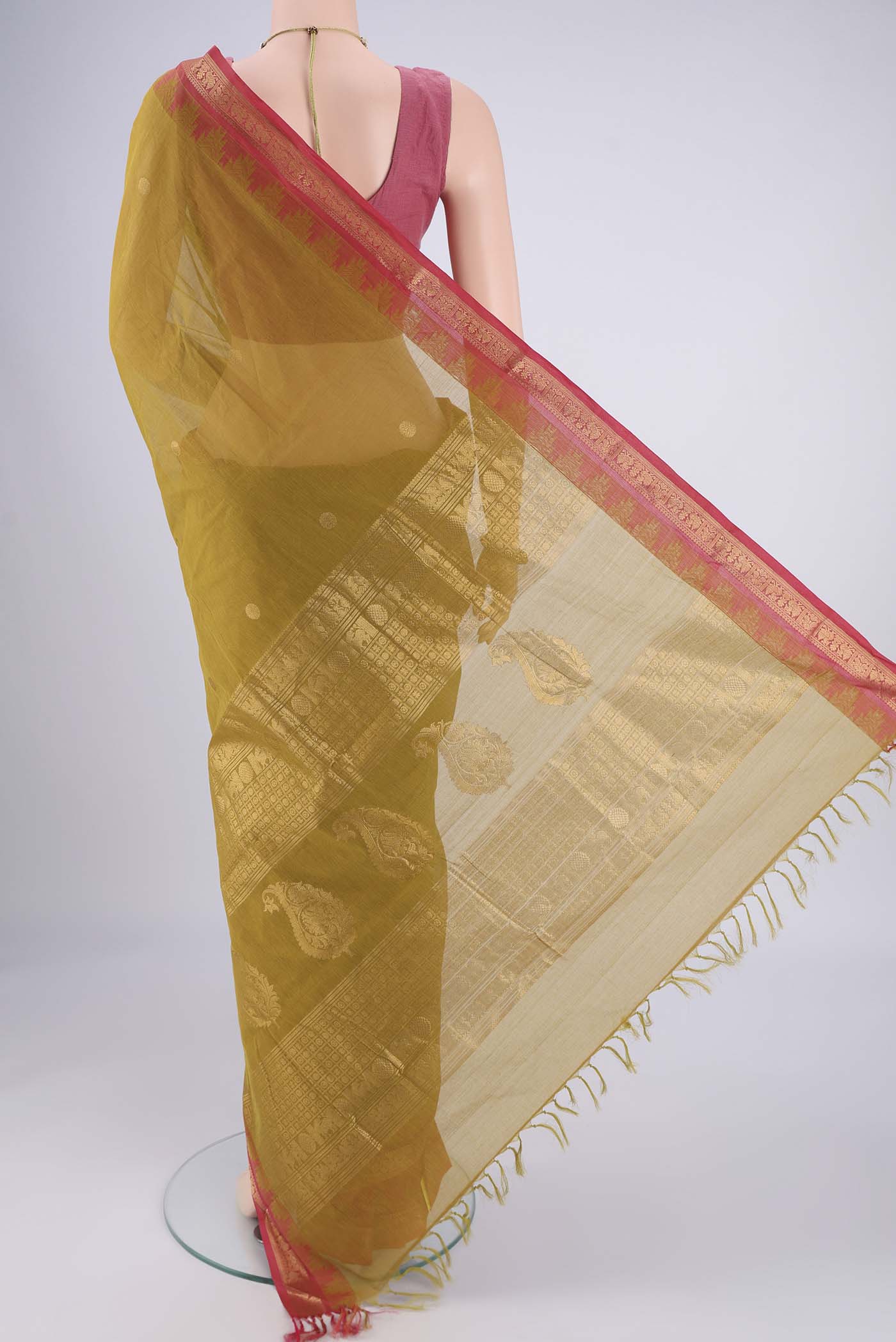 Flat view of Mehandi Green Kanchi Cotton Saree with Polka Dots on the body and Temple Border. 