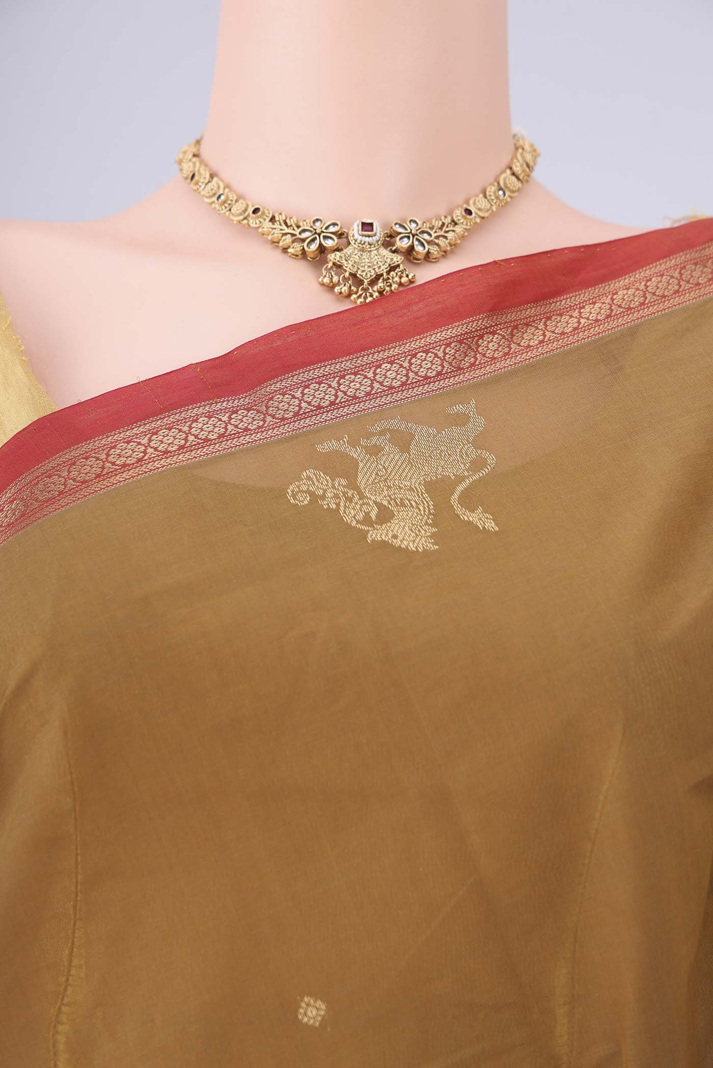 Border image of Mehandi Green Kanchi Cotton Saree with Plain Body and Zari Border. 