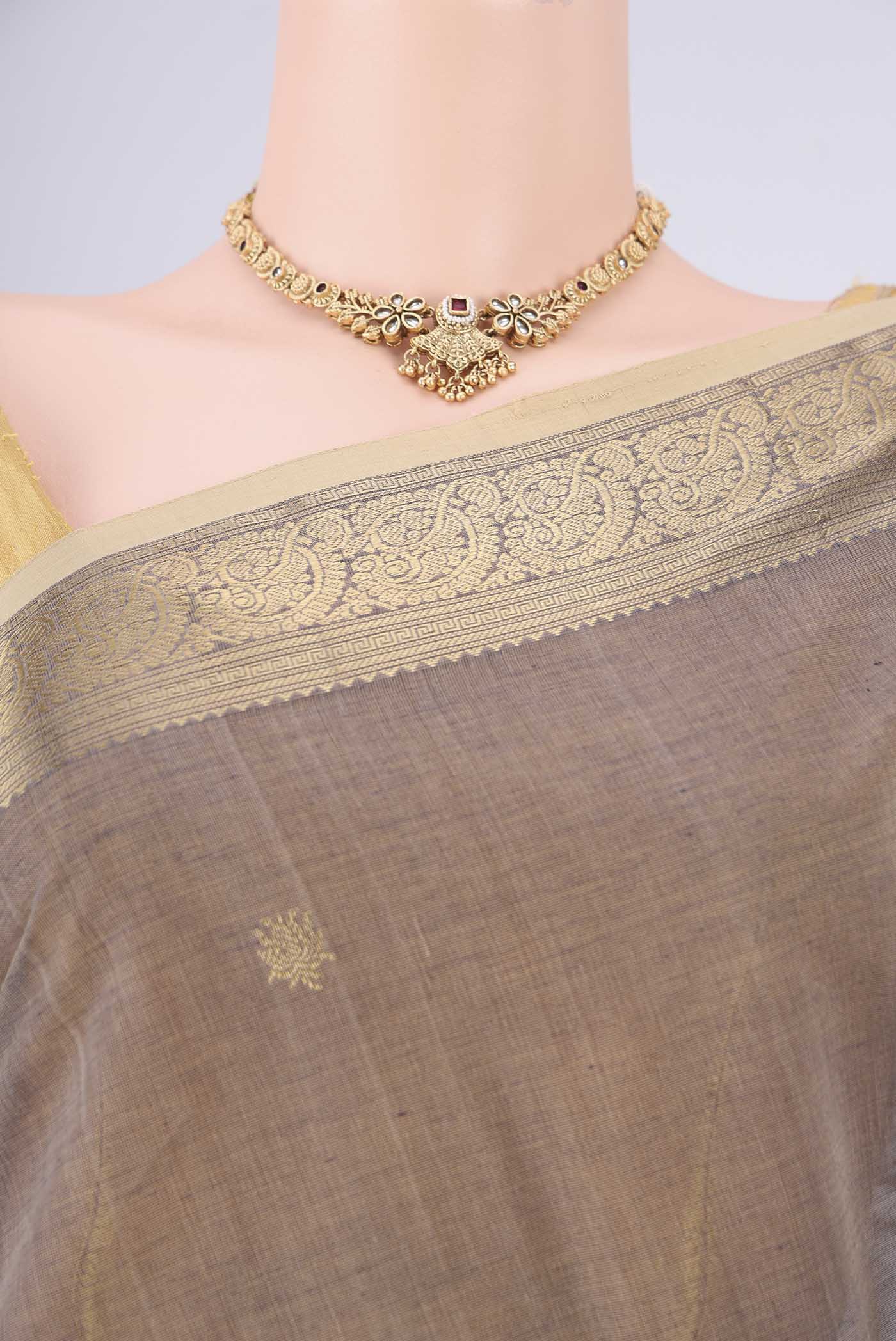 Border image of Grey Kanchi Cotton Saree with Plain Body and Zari Border. 