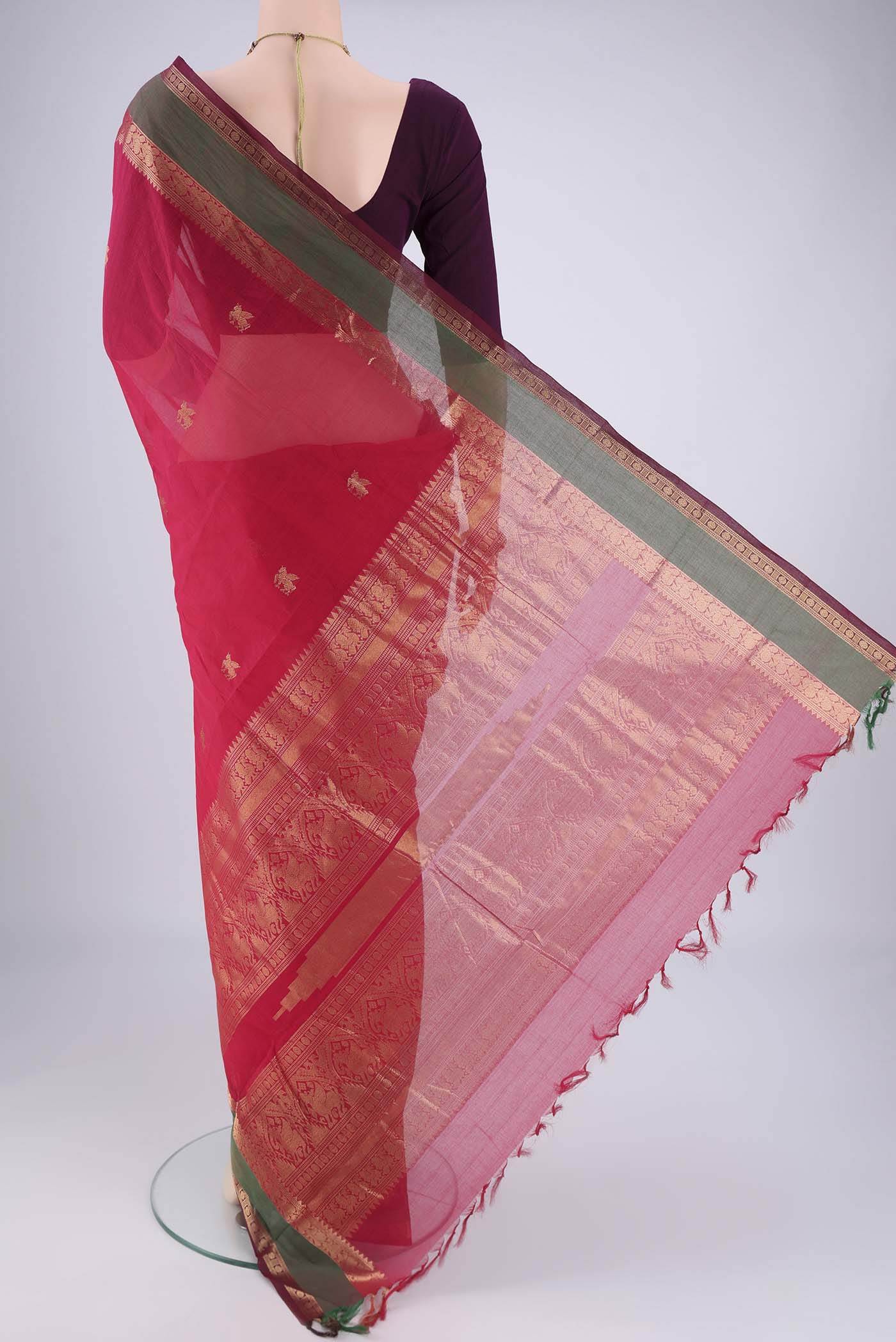 Flat view of Red Kanchi Cotton Saree with Plain Body and Zari Border. 