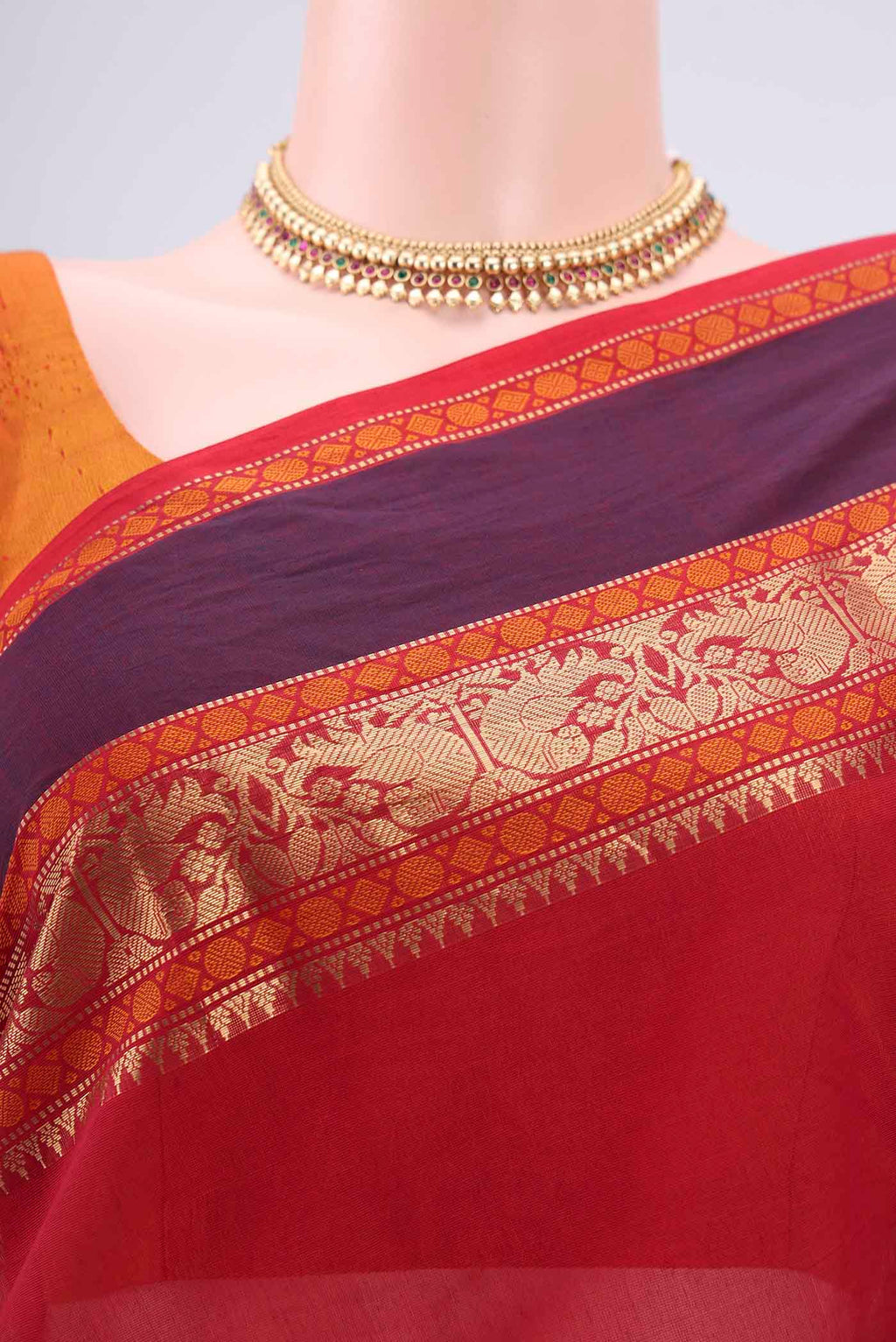 Border image of Red Kanchi Cotton Saree with Zari Butta on the body and Zari Border. 