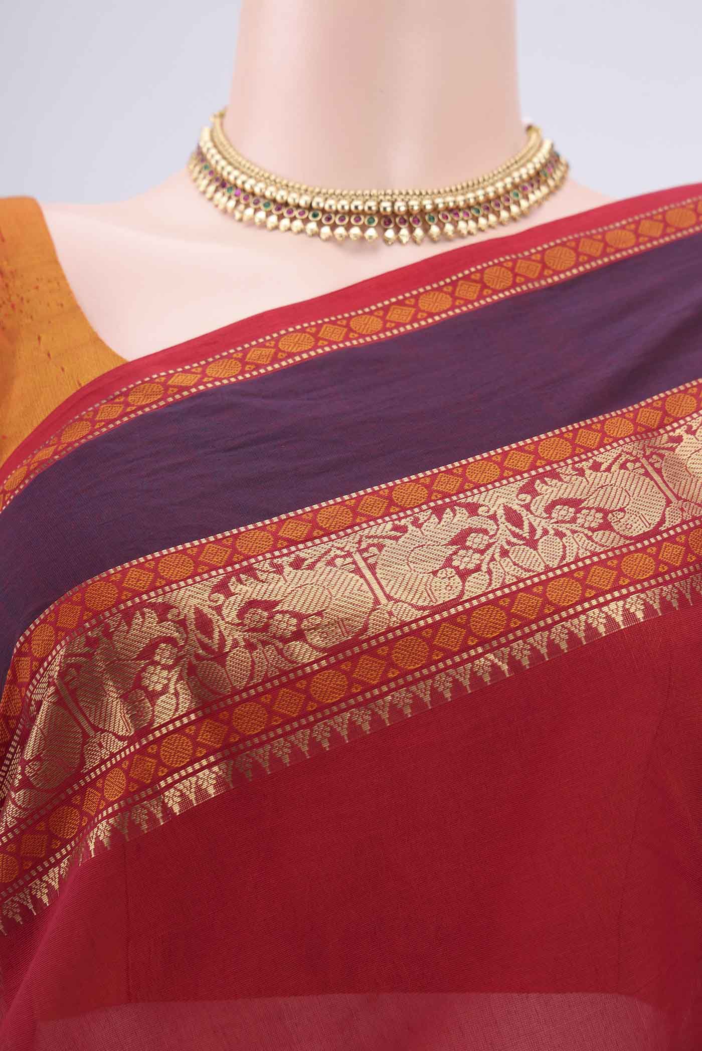 Border image of Red Kanchi Cotton Saree with Zari Butta on the body and Zari Border. 