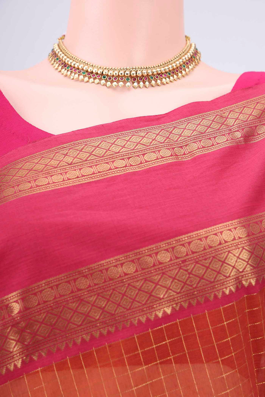 Border image of Rust Kanchi Cotton Saree with Checked design on the body and Zari Border. 
