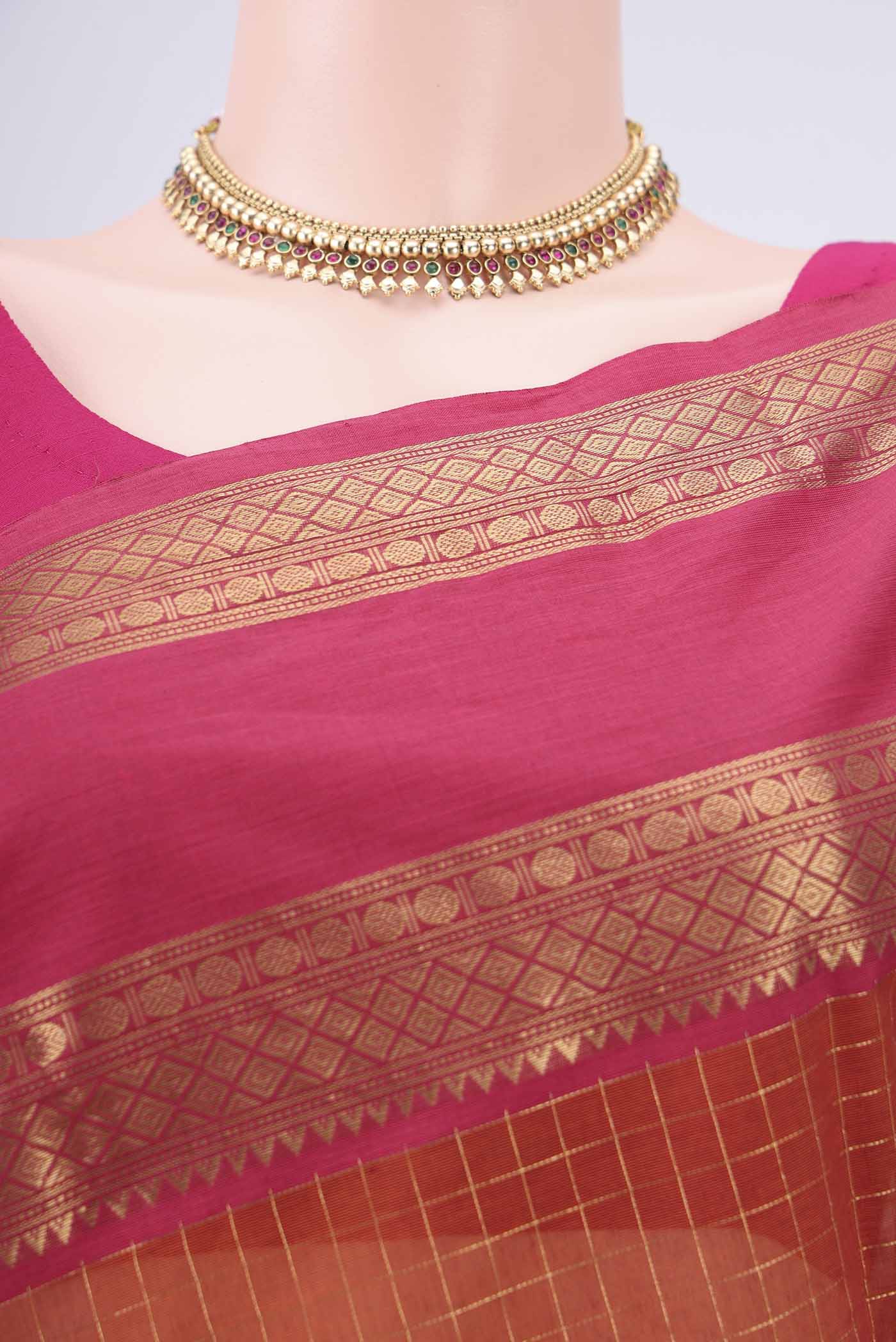 Border image of Rust Kanchi Cotton Saree with Checked design on the body and Zari Border. 