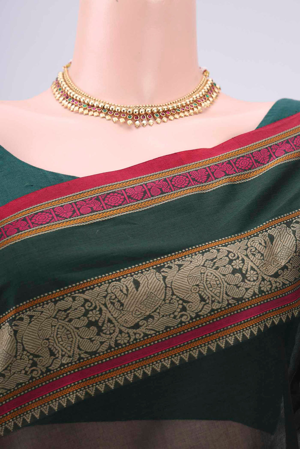 Border image of Bottle Green Kanchi Cotton Saree with Plain Body and Thread Border. 