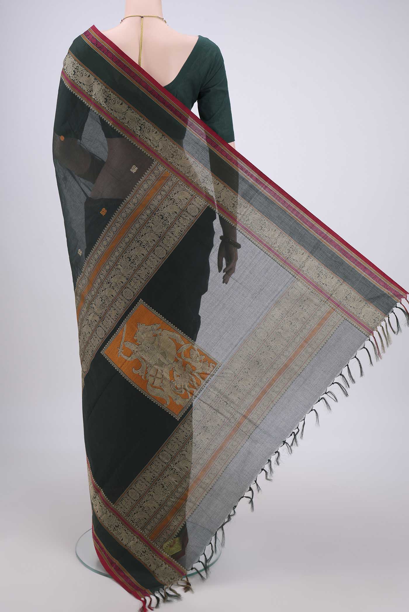 Flat view of Bottle Green Kanchi Cotton Saree with Plain Body and Thread Border. 
