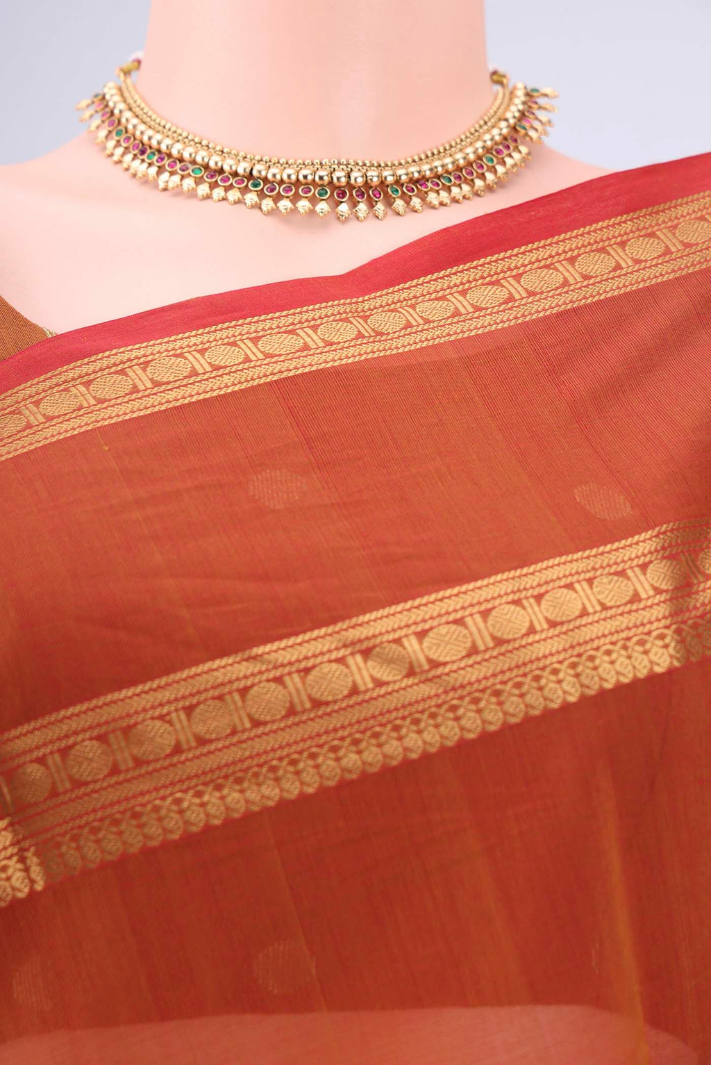 Border image of Rust Kanchi Cotton Saree with Plain Body and Zari Border. 