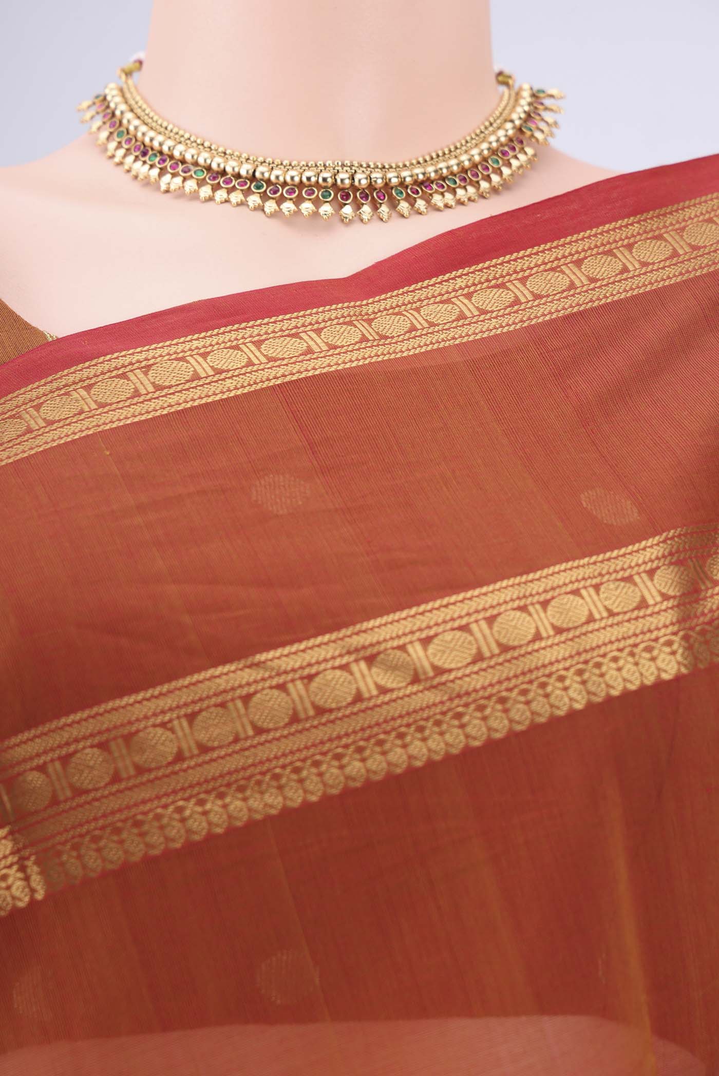 Border image of Rust Kanchi Cotton Saree with Plain Body and Zari Border. 