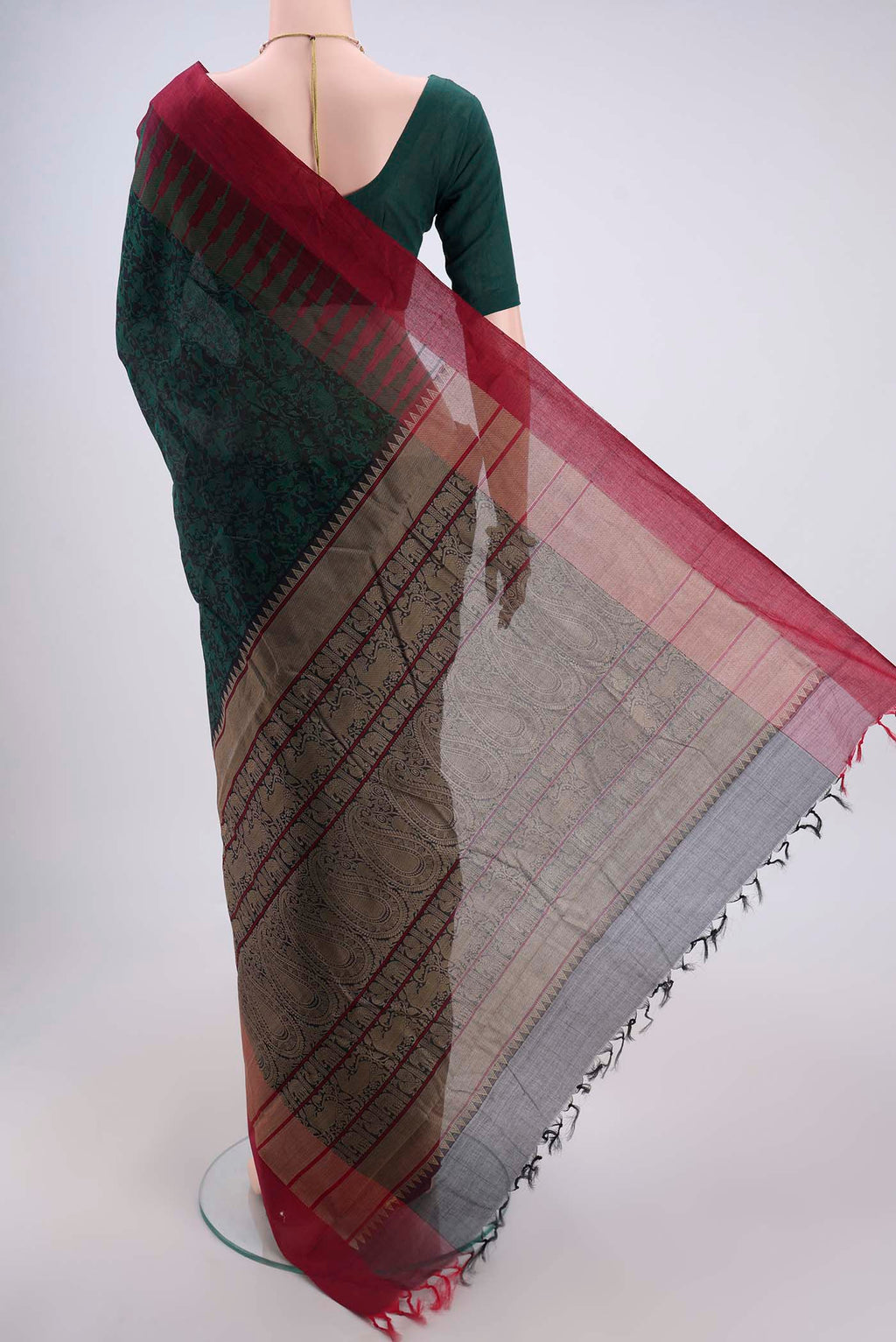Flat view of Bottle Green Kanchi Cotton Saree with Jacquard design on the body and Thread Border. 