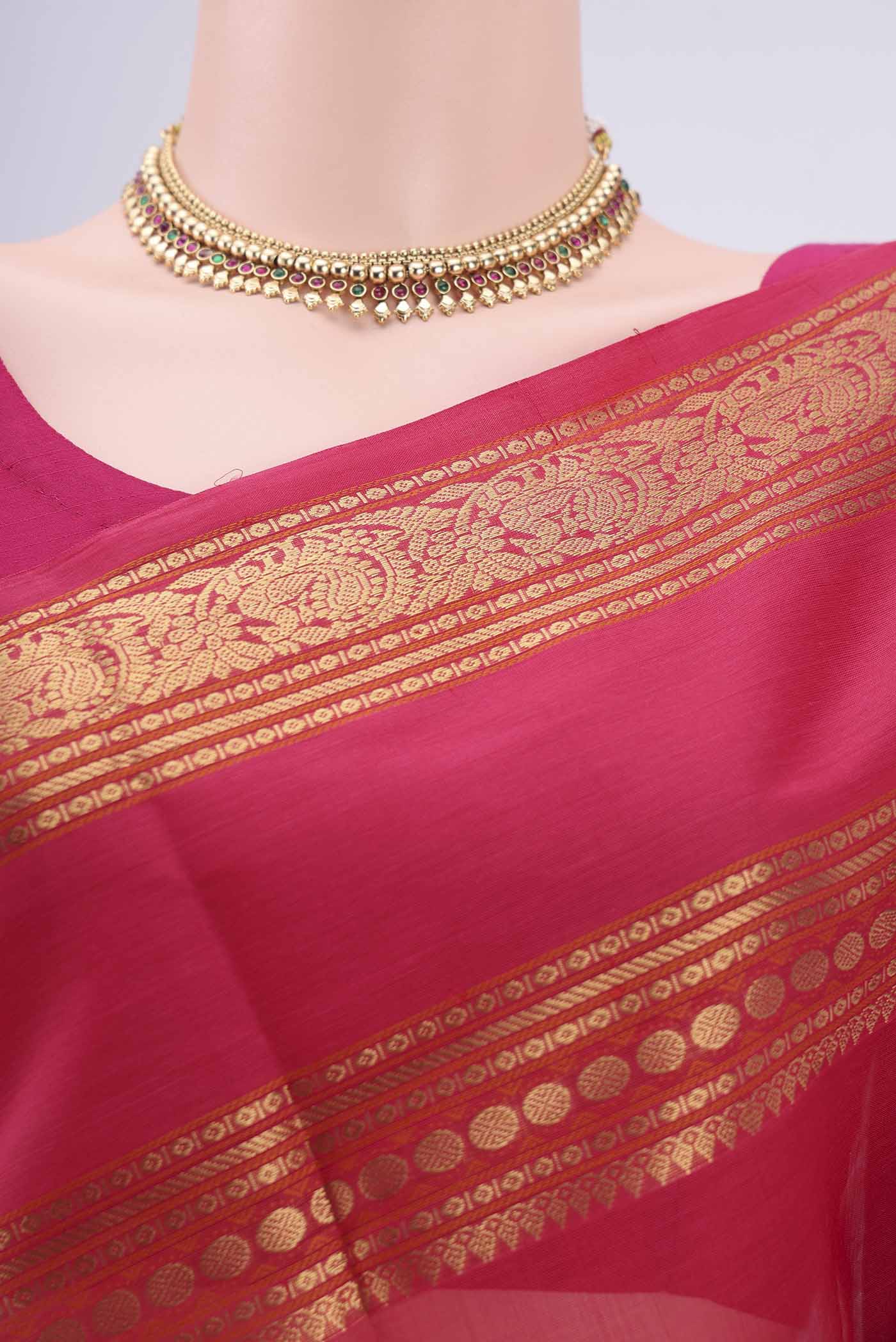 Border image of Dark Pink Kanjivaram Saree with Zari Butta on the body and Zari Border. 