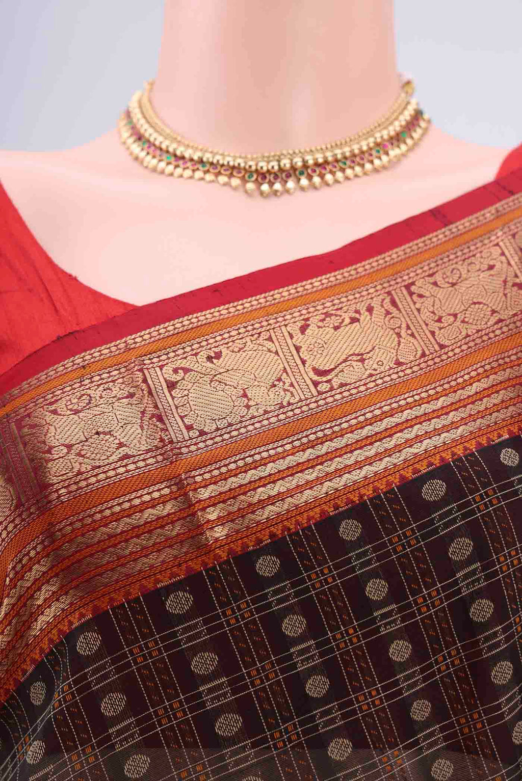 Border image of Black Kanjivaram Saree with Checked design on the body and Zari Border. 