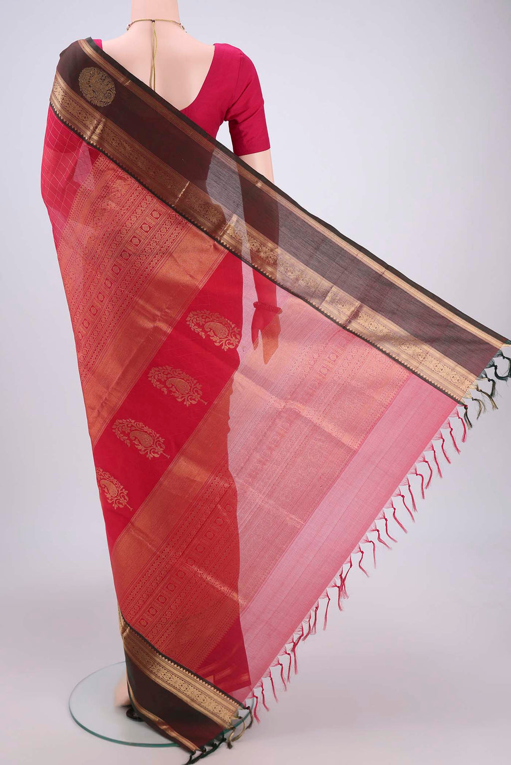 Flat view of Dark Pink Kanjivaram Saree with Checked design on the body and Zari Border. 