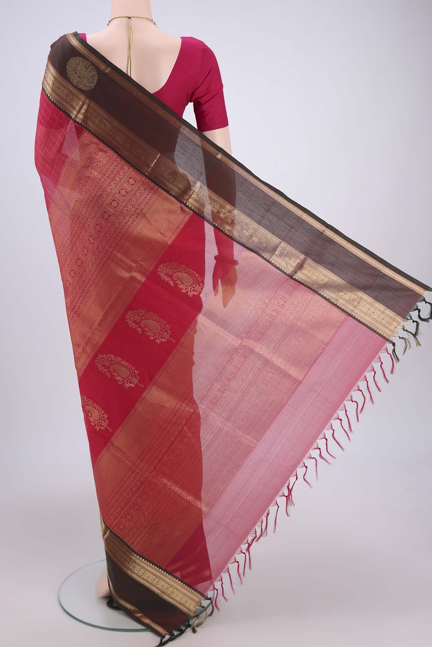 Flat view of Dark Pink Kanjivaram Saree with Checked design on the body and Zari Border. 