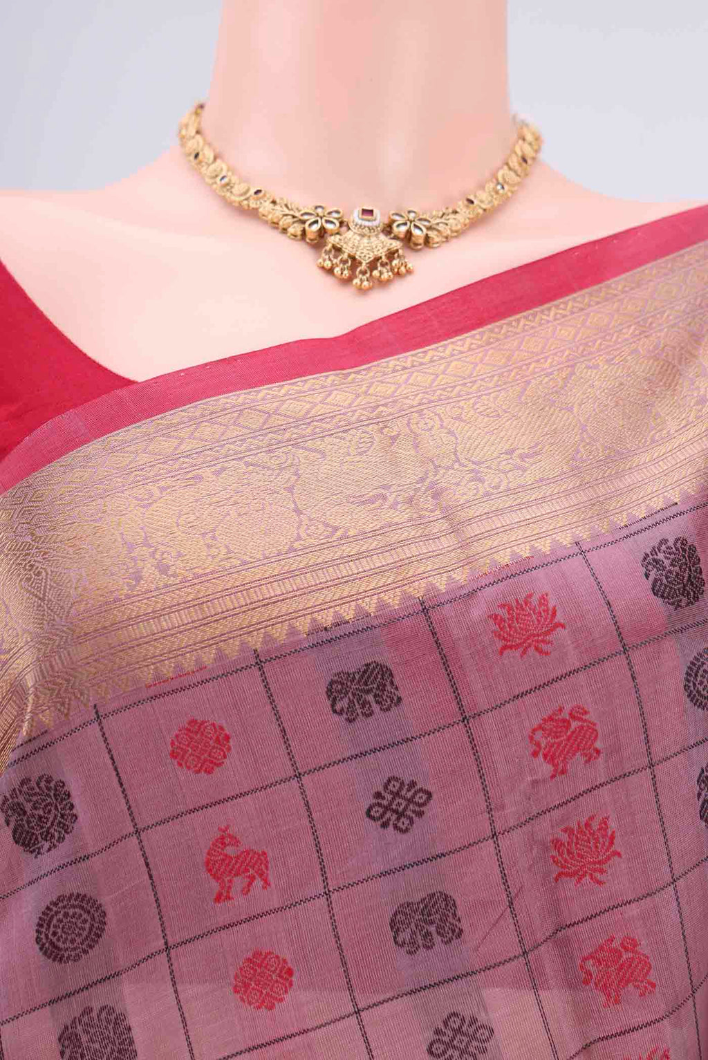 Border image of Lavender Kanjivaram Saree with Checked design on the body and Zari Border. 