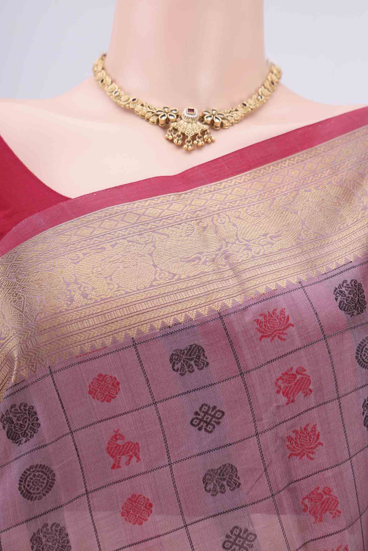 Border image of Lavender Kanjivaram Saree with Checked design on the body and Zari Border. 