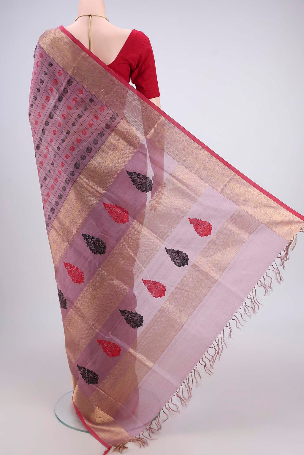 Flat view of Lavender Kanjivaram Saree with Checked design on the body and Zari Border. 