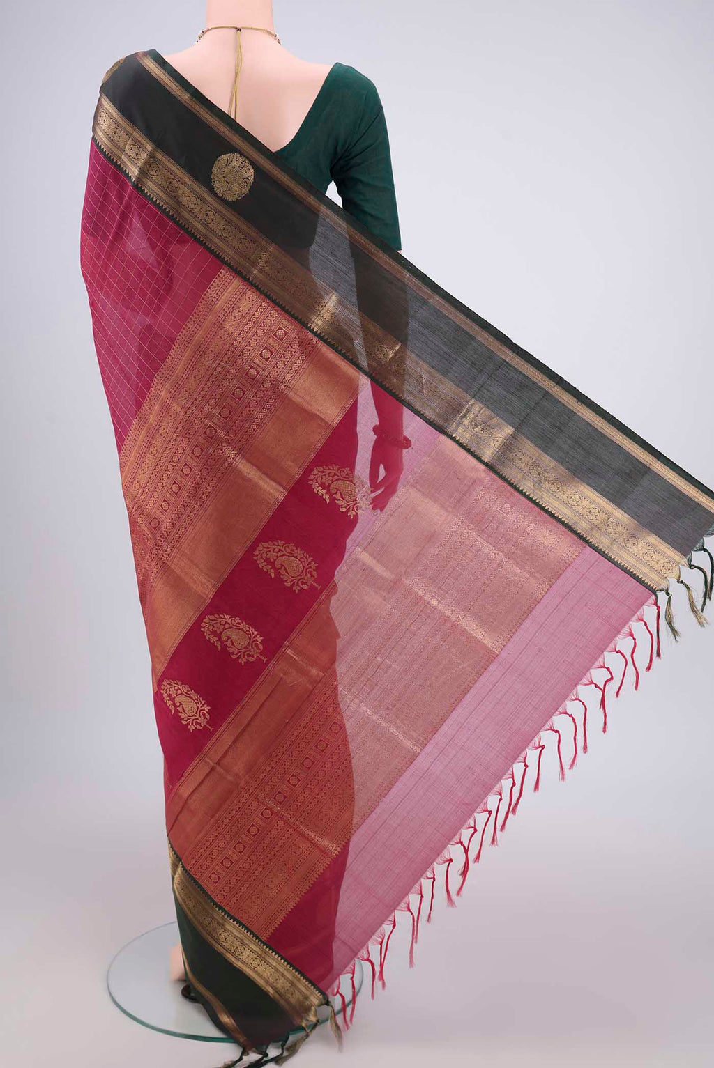 Flat view of Maroon Kanjivaram Saree with Checked design on the body and Zari Border. 