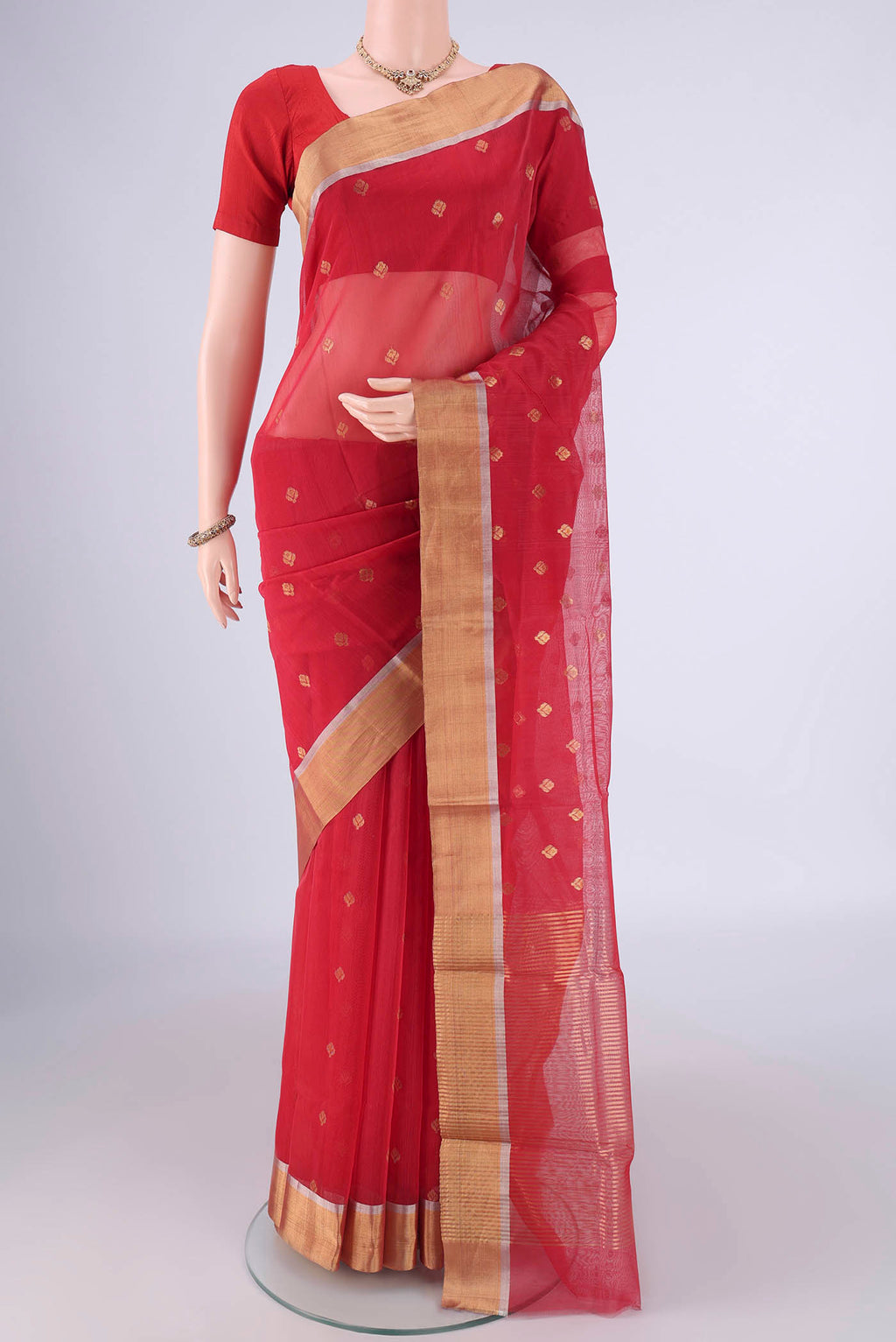 Red Chanderi Silk Cotton Saree with Zari Butta on the body and Zari Border.  displayed on a mannequin