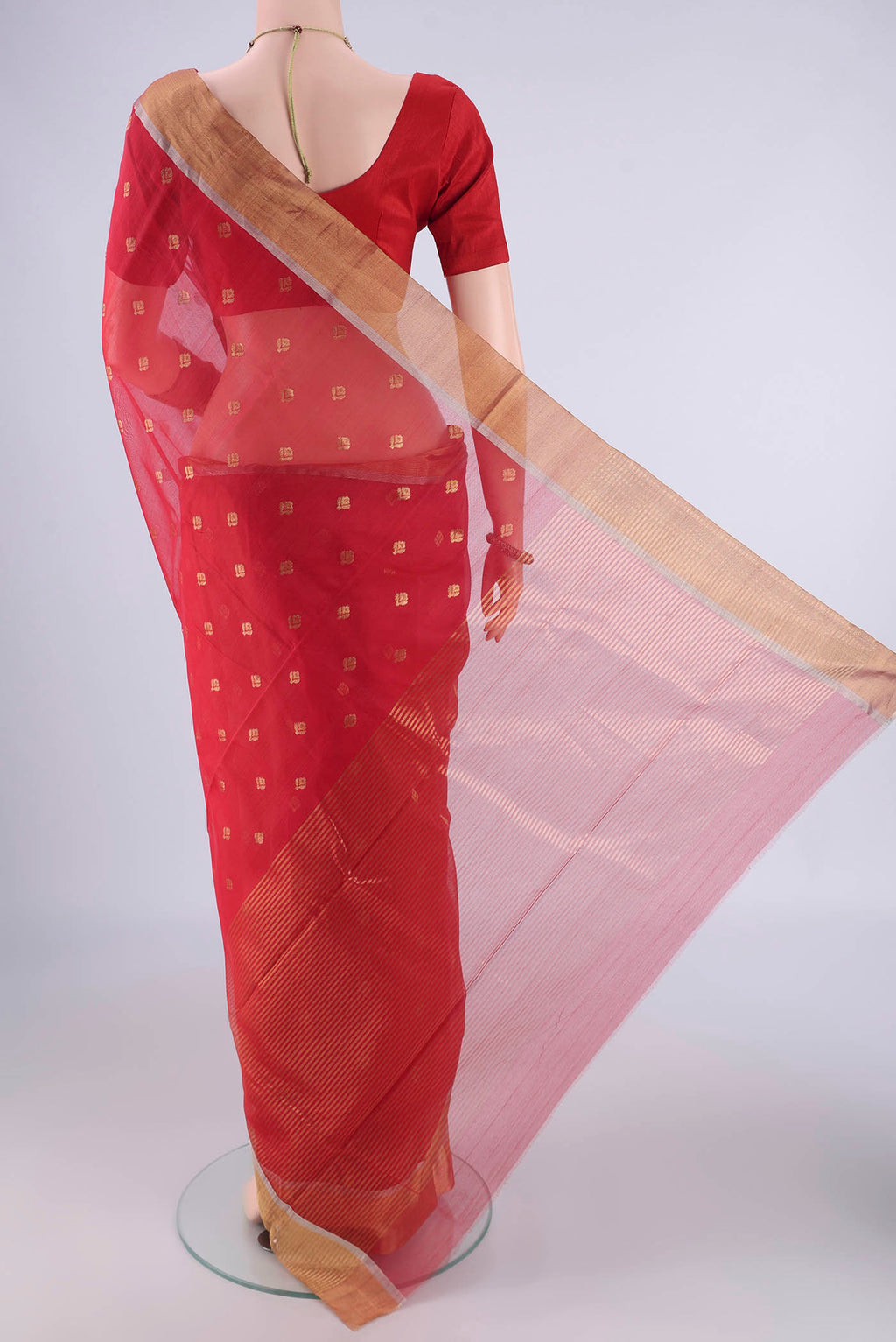 Flat view of Red Chanderi Silk Cotton Saree with Zari Butta on the body and Zari Border. 