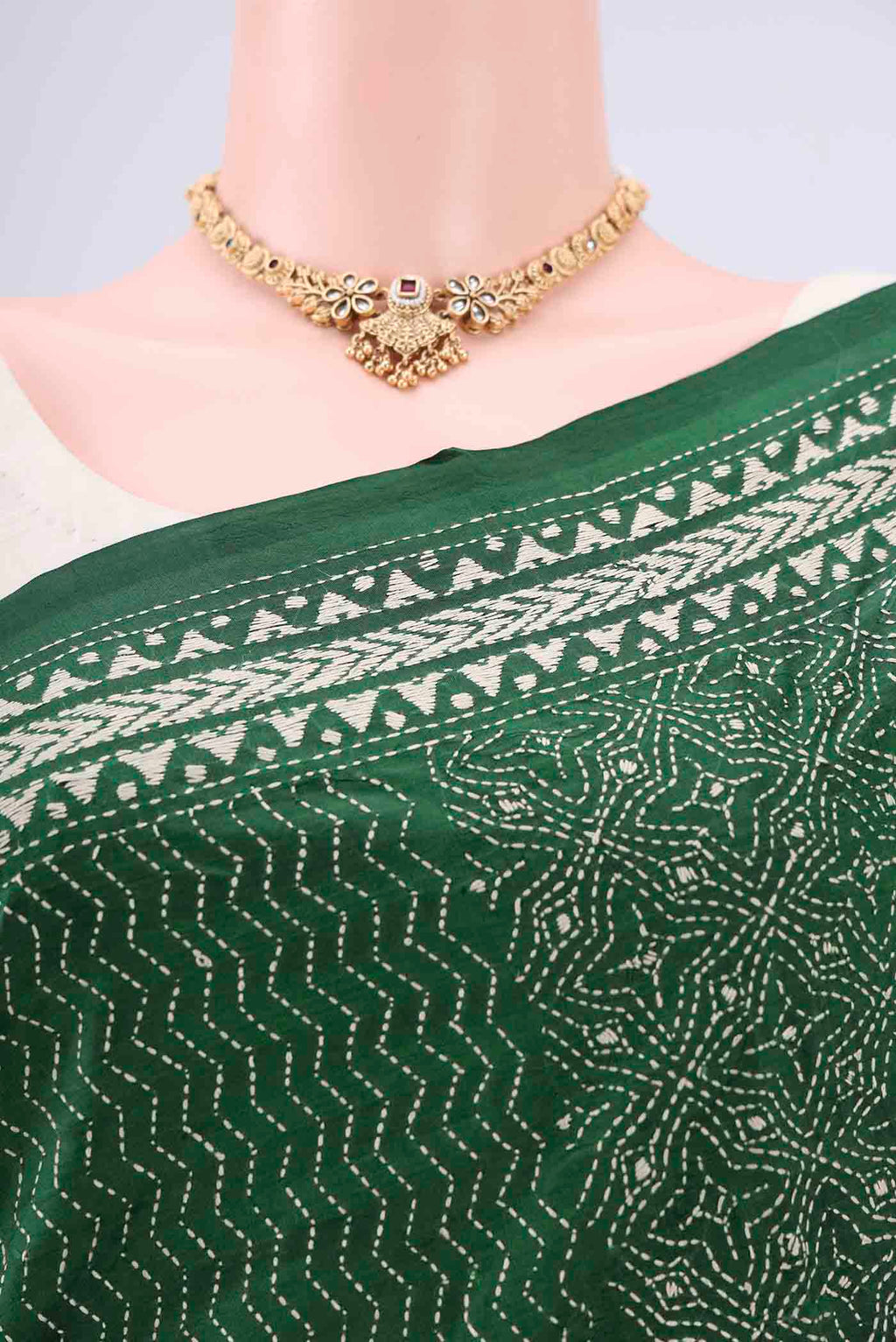 Border image of Bottle Green Kantha Silk Saree with Kantha Work on the body and Thread Border. 