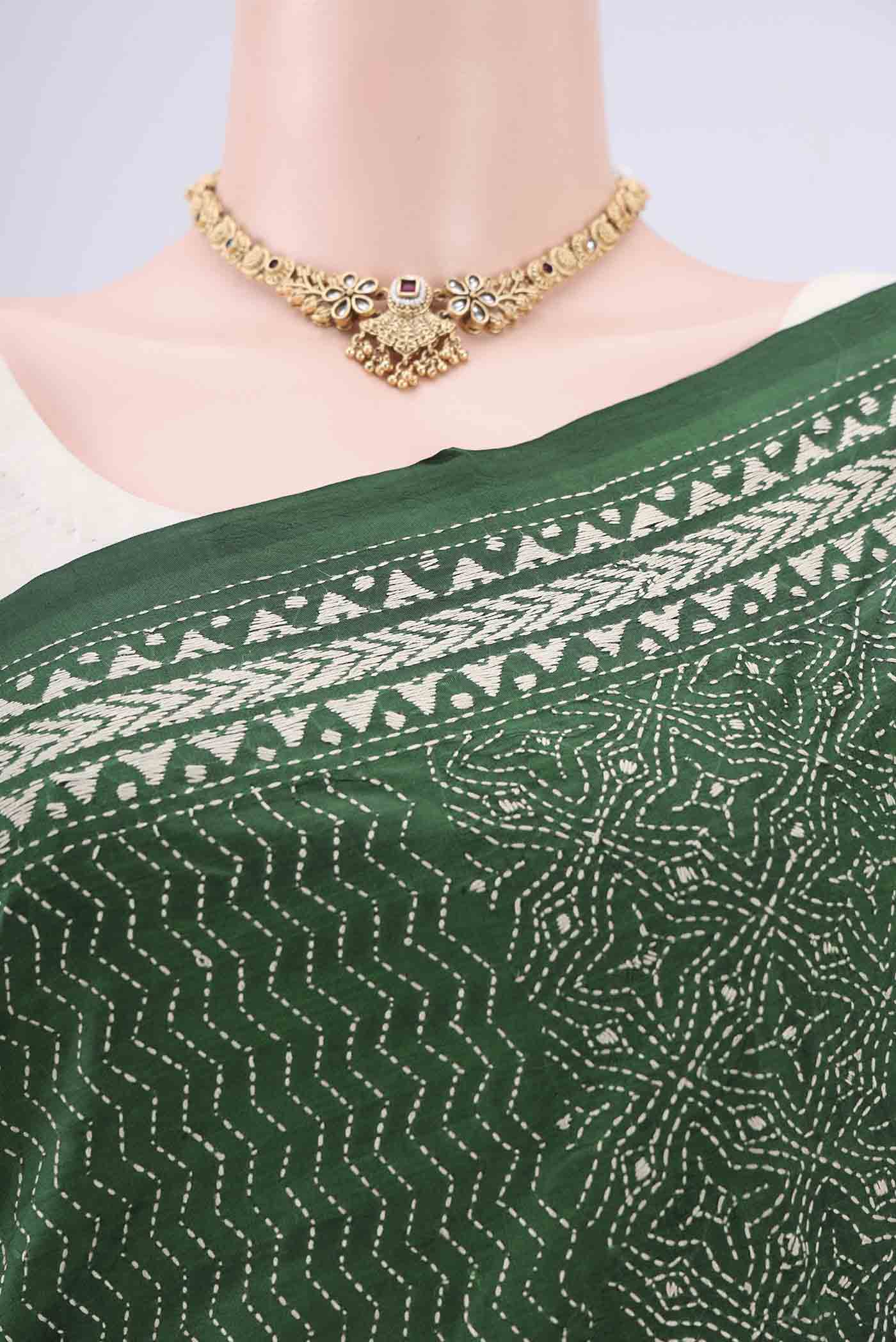 Border image of Bottle Green Kantha Silk Saree with Kantha Work on the body and Thread Border. 