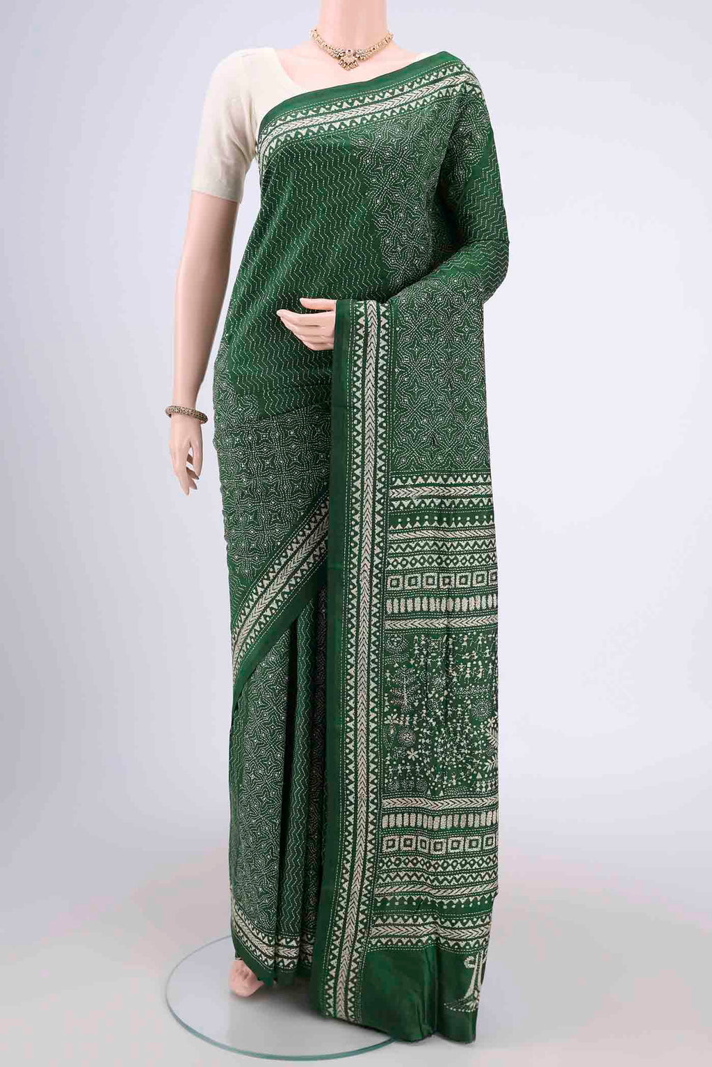Bottle Green Kantha Silk Saree with Kantha Work on the body and Thread Border.  displayed on a mannequin