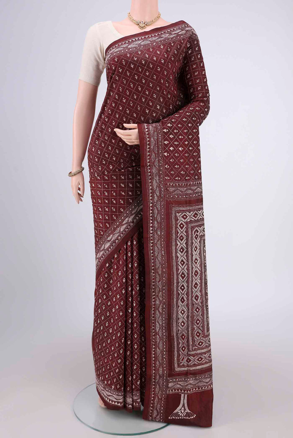 Coffee Brown Kantha Silk Saree with Kantha Work on the body and Thread Border.  displayed on a mannequin