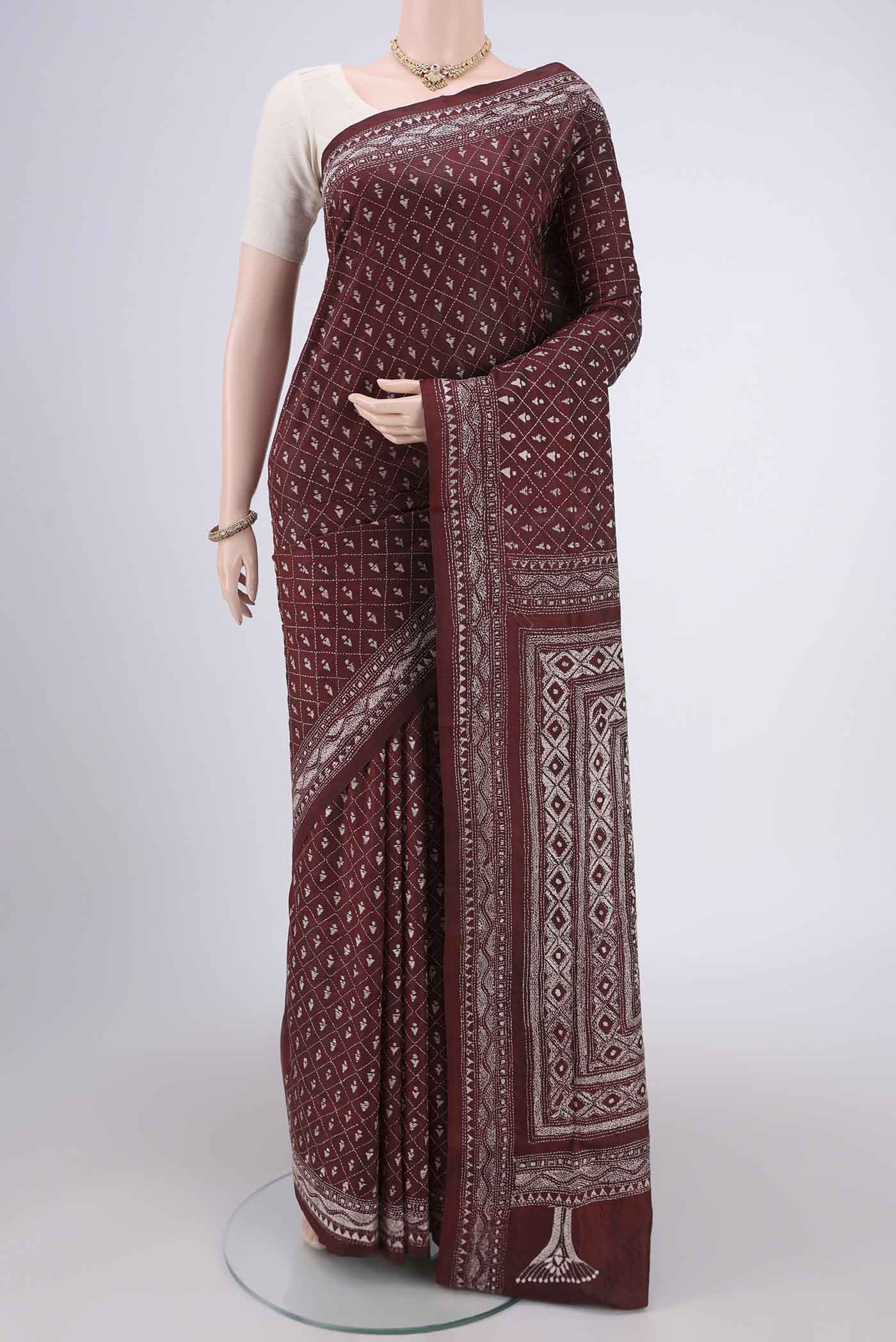 Coffee Brown Kantha Silk Saree with Kantha Work on the body and Thread Border.  displayed on a mannequin