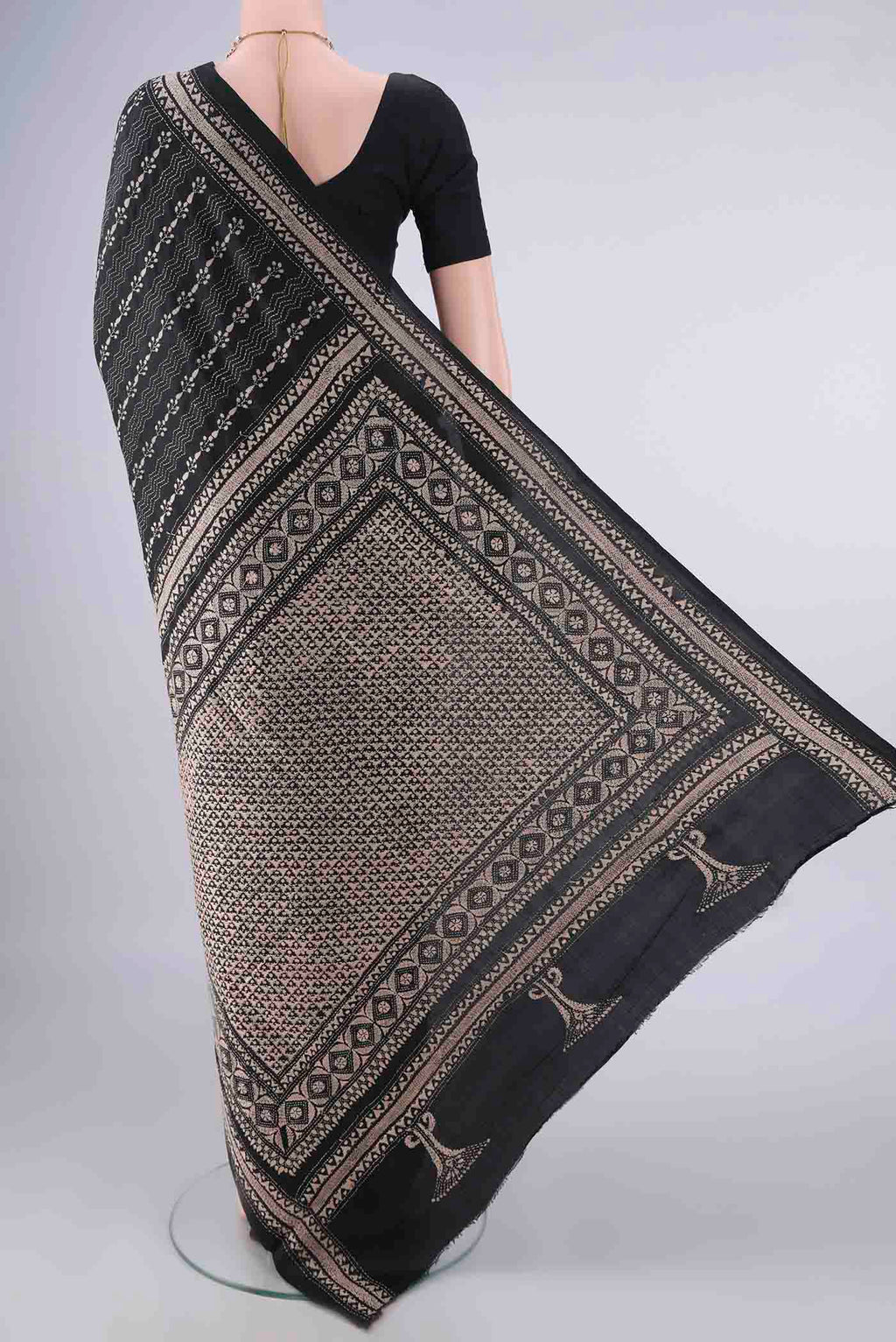 Flat view of Pure Silk Black Kantha Saree with Kantha Work on the body and Thread Border. 