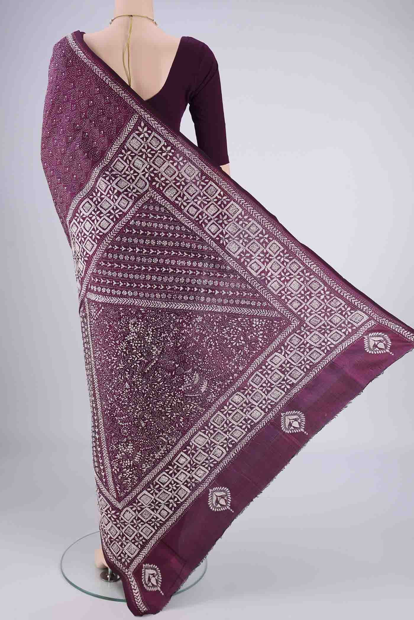 Flat view of Magenta Kantha Silk Saree with Kantha Work on the body and Thread Border. 