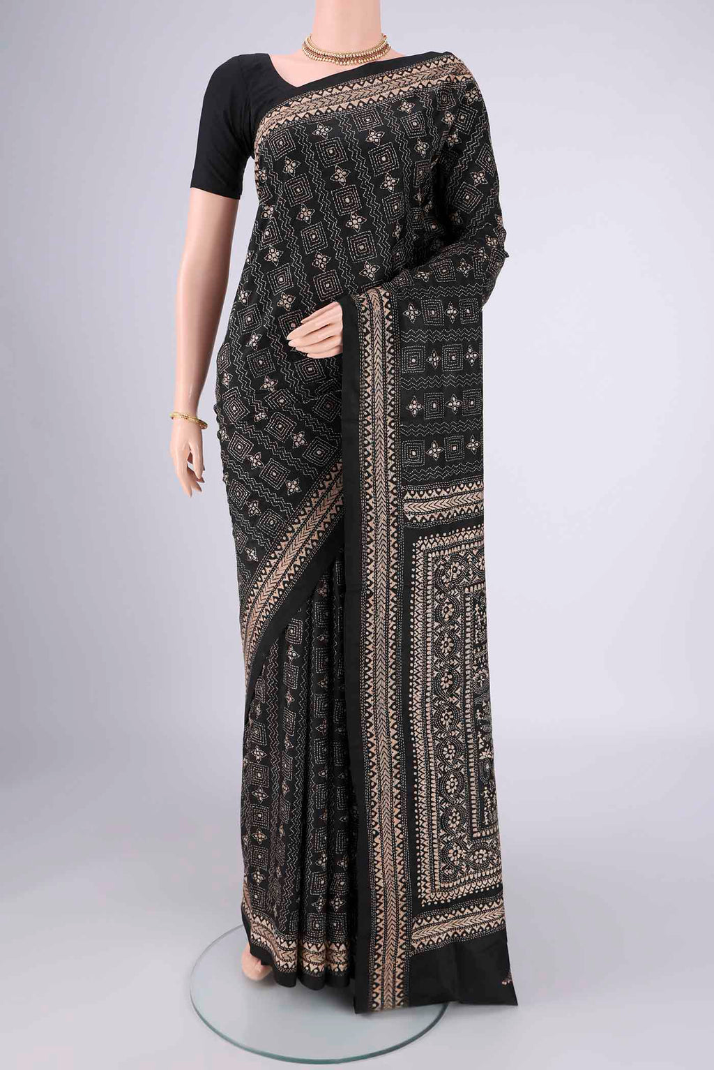 Black Kantha Silk Saree with Kantha Work on the body and Thread Border.  displayed on a mannequin