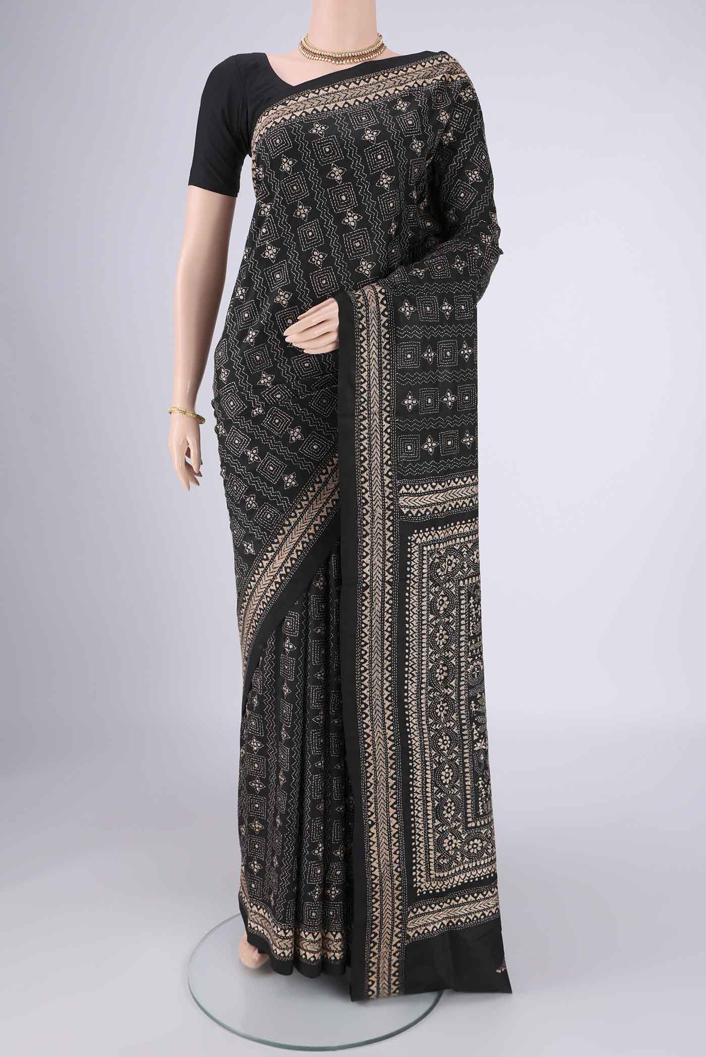 Black Kantha Silk Saree with Kantha Work on the body and Thread Border.  displayed on a mannequin