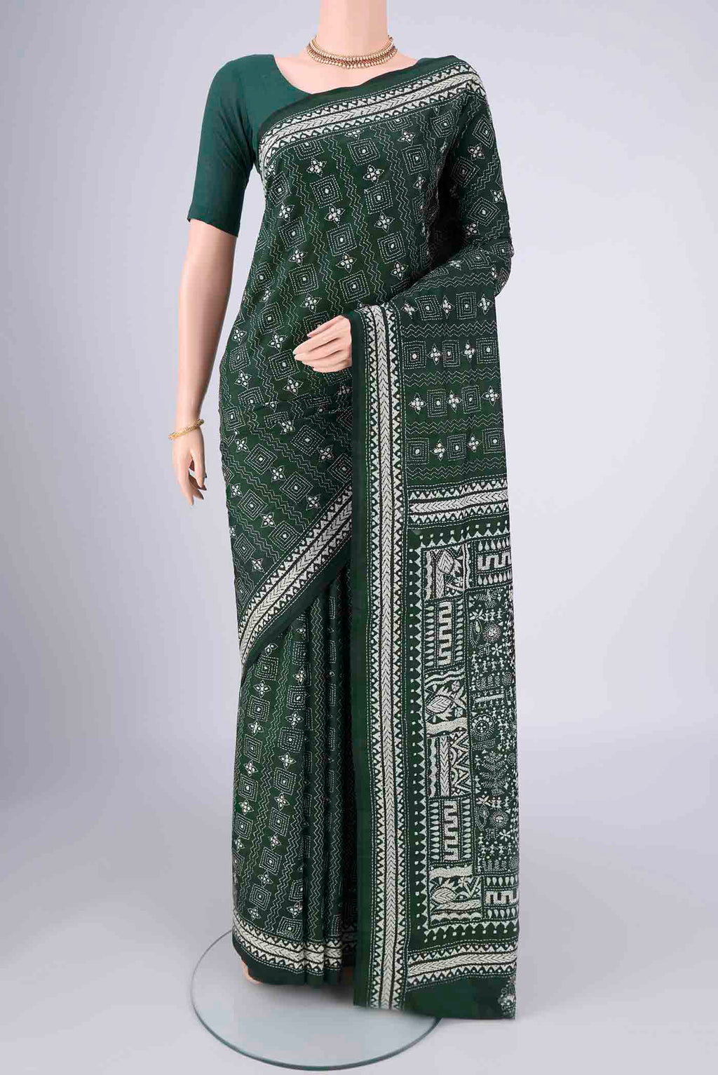 Bottle Green Kantha Silk Saree with Kantha Work on the body and Thread Border.  displayed on a mannequin