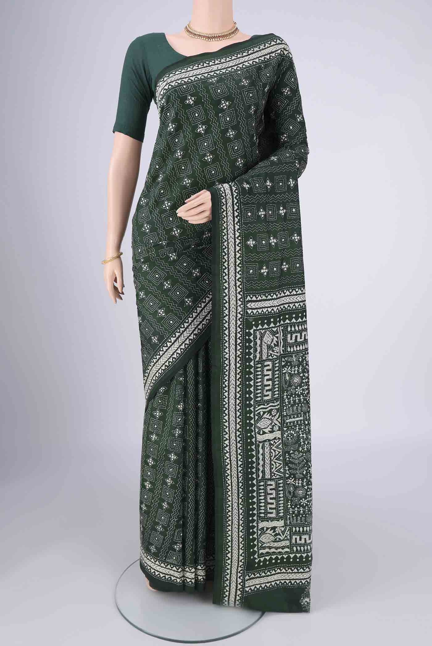 Bottle Green Kantha Silk Saree with Kantha Work on the body and Thread Border.  displayed on a mannequin