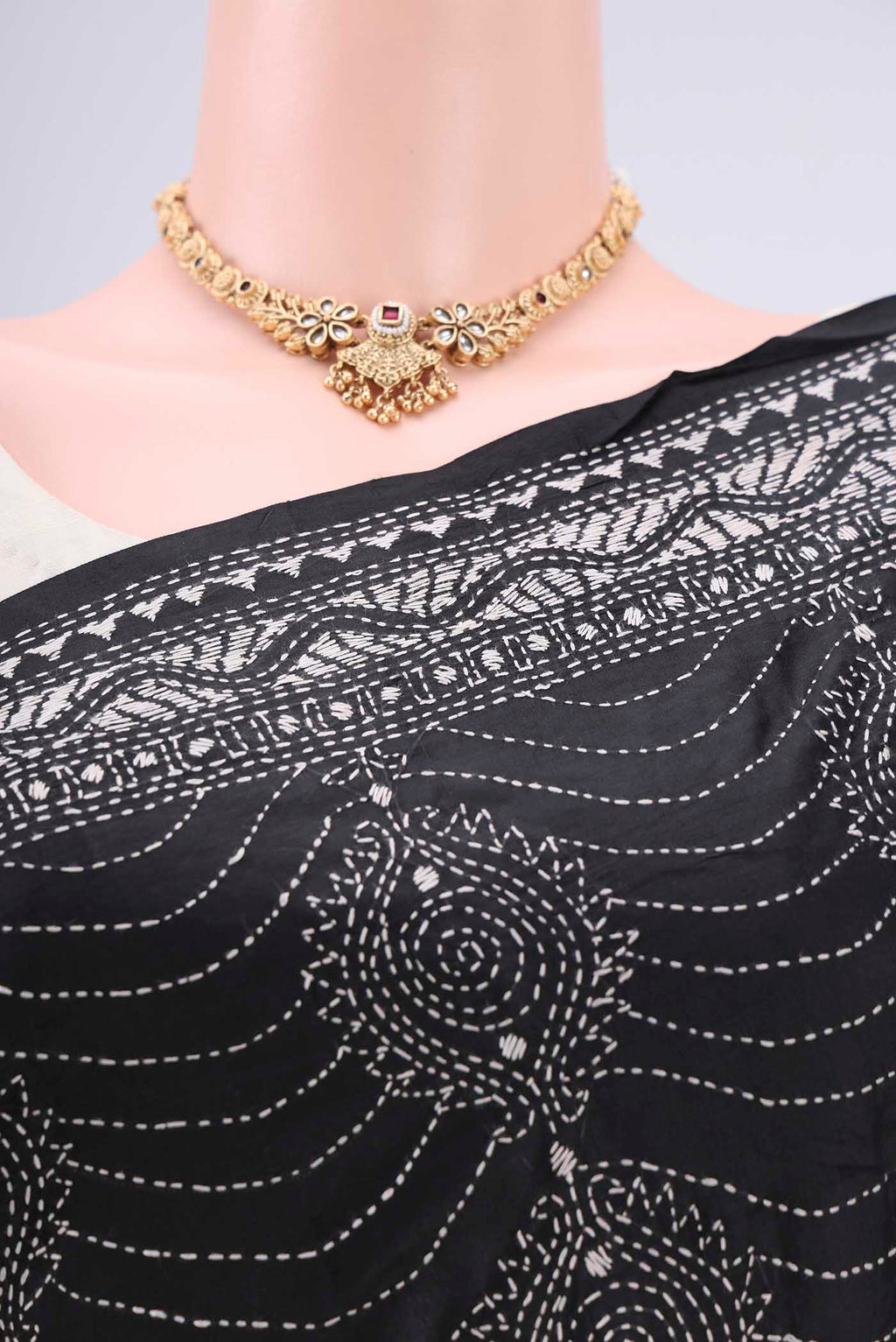 Border image of Black Kantha Silk Saree with Kantha Work on the body and Thread Border. 