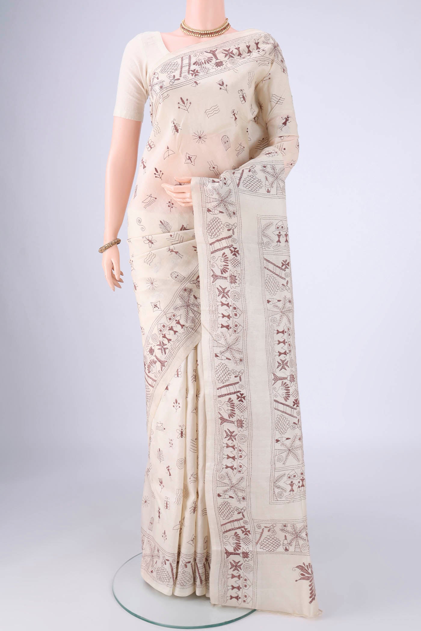 Beige Tussar Silk Saree with Kantha Work on the body and Thread Border.  displayed on a mannequin